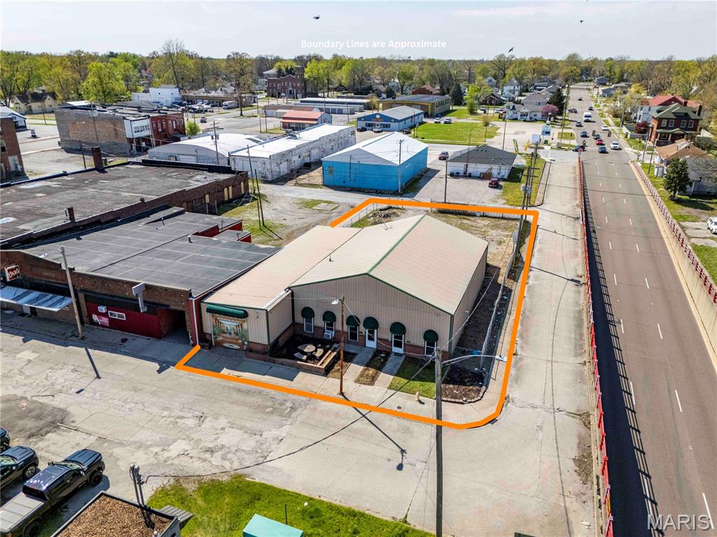 Located in Centralia, this versatile commercial property offers approximately 5,000 square feet of functional space on a 0.3-acre lot, making it a great fit for a variety of business uses. The building is thoughtfully set up with two separate office areas, each featuring its own private entrance, kitchenette, and full bathroom—perfect for multiple tenants or flexible workspace options.

The property is fully fenced for added security and includes an electronic gate at the rear entrance for controlled access. A large gravel lot in the rear provides plenty of space for parking, storage, or equipment. The building also features three 12-foot garage doors—two in the rear and one in the front—making it easy to accommodate vehicles, deliveries, or shop use. Zoned B-2, this property is well-positioned for a wide range of commercial opportunities.