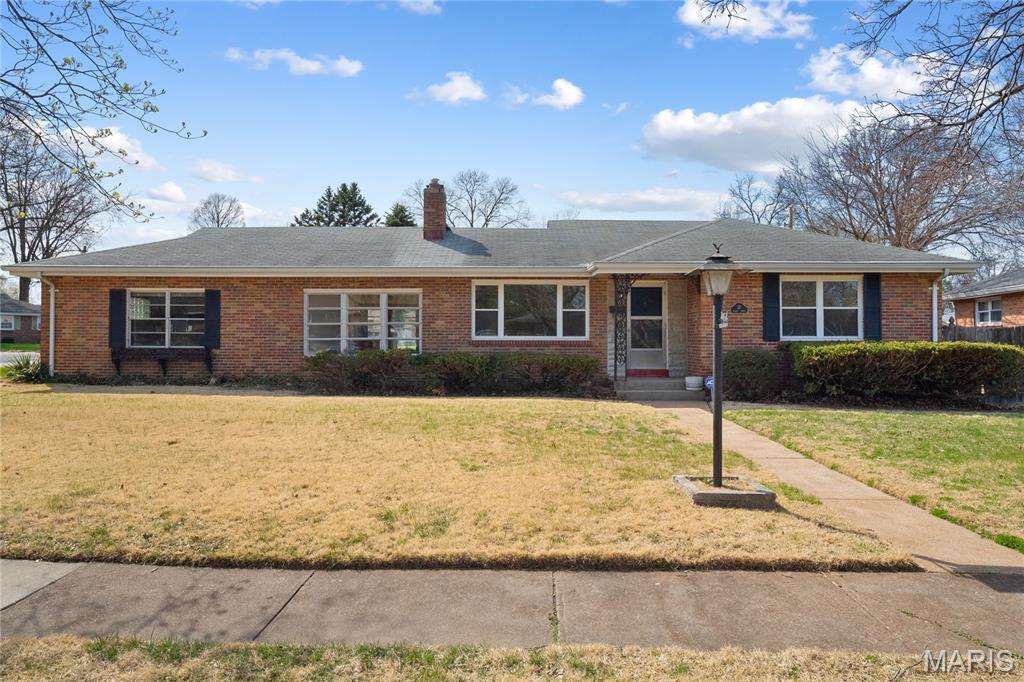 Plenty of room to relax at this large, all-brick ranch home available for immediate lease in Florissant. Big windows throughout the home let in natural light, and the large kitchen will satisfy the fussiest of chefs. And two bathrooms (a large one with tub/shower upstairs, and a second w/ shower downstairs) allow for plenty of bathing privacy. The finished basement is huge, boasting over 500 square feet of usable bonus space, plus the private second bathroom. The downstairs corner room would make a perfect home-office or gym. Plenty of extra storage for you on account of the two-car garage and storage shed (for lawnmower, etc.). The unfinished basement area has a sizable workbench with additional outlets as well. Clean and comfortable, this home also has a newer water heater, and newer furnace, and AC—no need to be bothered with work orders and repairs. Home is located on a private corner lot and part of a quiet, well-established subdivision. Easy access to 270, 170, and Interstate 70, plus local Florissant shopping. 2 year lease required. Tenant pays all utilities including sewer. This is a NON SMOKING HOME.