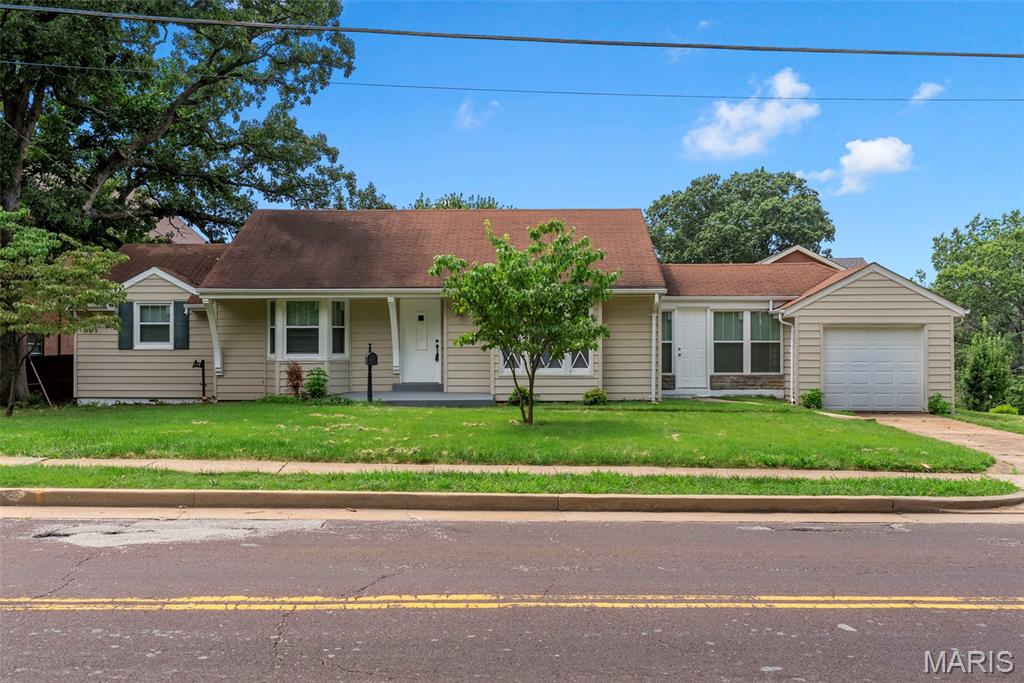 Welcome to this charming 3-bedroom, 1-bathroom ranch located in the heart of Webster Groves! With parks within walking distance, easy highway access, and plenty of nearby shopping, dining, and entertainment, this home offers a location that is hard to beat.

As you step inside, you’ll immediately notice the beautiful hardwood floors that run throughout the main level and are in excellent condition. The kitchen has been nicely updated and features newer stainless steel appliances, newer cabinets, quartz countertops, and ceramic tile flooring, creating a clean and functional space with plenty of room for everyday use.

The freshly updated bathroom features a tub and shower with modern finishes. All three bedrooms are generously sized and offer plenty of natural light and closet space. One of the highlights of the home is the sunroom located just off the kitchen and living room. This space provides the perfect spot to enjoy your morning coffee, unwind at the end of the day, or simply enjoy a peaceful moment overlooking the yard. The home also features a one-car garage for additional parking and storage. Downstairs, the unfinished basement provides plenty of additional storage space and offers great potential for a future finished area, home gym, workshop, or additional entertaining space. To top it all off, the AC is brand new, providing added peace of mind for the next owner. With its updated features, spacious layout, beautiful hardwood floors, and prime Webster Groves location, this home is ready for its next owner. Schedule your showing today!
