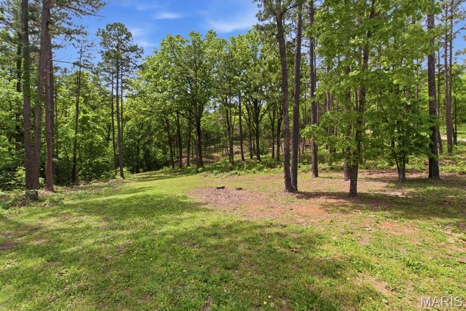 MLS # Build your dream getaway in the heart of the Ozarks with this rare opportunity to own riverfront property on the beautiful Jacks Fork River in Eminence! Seller is offering newly divided riverfront lots, providing the perfect setting for a vacation home, cabin retreat, Airbnb investment, or full-time residence. This 0.79± acre lot offers access to city water, sewer, and electric, making development even more convenient. Owner is retaining one adjoining lot which will include a private road down to the river. Purchasers of the riverfront lots will have shared access to use the road for easy river access and enjoyment of all the beauty the Jacks Fork has to offer. Enjoy floating, fishing, kayaking, swimming, and relaxing right from your own property. Located just minutes from downtown Eminence, restaurants, shopping, and thousands of acres of Mark Twain National Forest, this is an excellent opportunity to own a piece of one of Missouri's most desirable recreational areas. Rare small-acreage riverfront tracts with utilities available are hard to find--don't miss your chance!