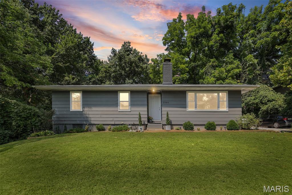 Welcome home to 5944 Sugar Loaf Road. This inviting 3-bedroom, 1.5-bath ranch is nestled on a private lot in Collinsville! With approximately 2,400 square feet of finished living space, this home offers comfortable everyday living with plenty of room to entertain. The open-concept kitchen, dining, and living areas create an easy flow for gatherings, while sliding doors extend the living space outdoors to enjoy the private setting on the deck. Three spacious bedrooms receive loads of natural light providing comfortable retreats. The tastefully updated full bath features a stylish double vanity; great for those busy work and school mornings. The expanded living space moves to the finished basement where you can enjoy game night, a movie or cocktails in the spacious recreation room. Don't forget the bonus room ideal for a home office or gym, large utility room, and convenient half-bath. Whether you're relaxing at home or hosting friends and family, you'll appreciate the thoughtful layout, abundant living space, and convenient location.