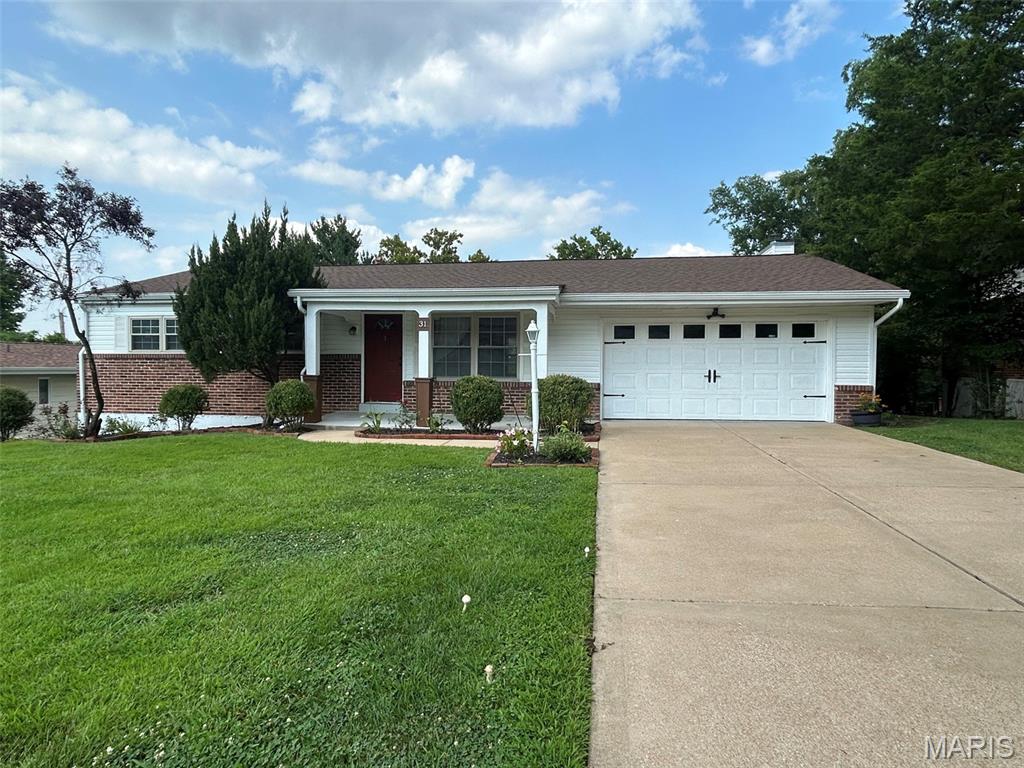 This beautiful, well-maintained, and updated ranch-style home features 3 bedrooms and 2.5 bathrooms, offering the perfect blend of comfort, functionality, and space for today's family lifestyle. The kitchen is stunning and spacious, boasting ceramic tile flooring and granite countertops!  The home features an open-concept layout that includes a large main living area and an additional multi-purpose room with a fireplace; it also offers new carpeting ( that will be installed within 2 to 3 weeks) in all three bedrooms and tile flooring in the two full bathrooms on the main level. The lower level includes a half-bath and plenty
of extra living space, thanks to its fully finished areas. The deck is very inviting, making it ideal for social gatherings. Situated in the Pattonville School District, the home enjoys an excellent location close to highways, shopping, and restaurants.