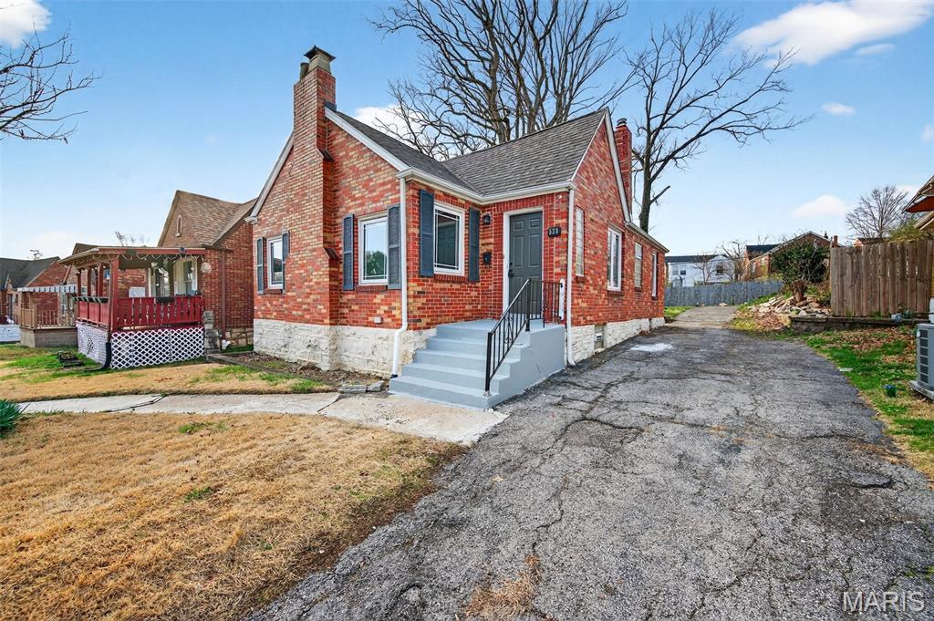 They don't build them like this anymore! This 1937 brick and stone bungalow at 520 Ruthland Drive is a rare find in today's market - offering genuine craftsmanship, a wood-burning fireplace, and bones that will outlast anything built in the last 50 years. Set in the popular Kingston Park subdivision of South St. Louis County, this 2-bedroom, 1-bath home sits on a generous 0.13-acre lot with a fenced-in backyard and private patio - ideal for gardening, entertaining, or simply unwinding after a long day. Inside, the layout is smart and efficient, with two comfortable bedrooms and a full bath all on the main level for easy, single-floor living. The full basement is where the real opportunity lies - featuring a dedicated workshop and hobby area that's already set up for your next project. Finish the remaining space and nearly double your living square footage! Located in the highly regarded Mehlville R-IX school district and just a short drive from Grants Trail, Cliff Cave County Park, and the shops and restaurants along Lemay Ferry Road - come see this one before it's gone!