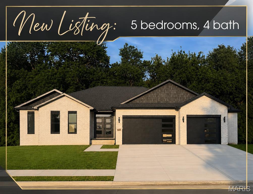 Welcome to 3825 N. Arbor Lake Dr., Edwardsville—a stunning newly constructed ranch offering 5 bedrooms, 4 baths, and an impressive combination of quality craftsmanship, beautiful design, and contemporary finishes.  Step inside to a light and bright with front views of the neighborhood lake.  The open floor plan features gorgeous luxury vinyl plank flooring throughout the main and lower levels. The heart of the home is the show-stopping kitchen, beautifully appointed with custom cabinetry and under-cabinet lighting, solid-surface countertops, a tile backsplash, stainless steel appliances, a spacious walk-in pantry, and an oversized island perfect for gathering and entertaining. The adjoining great room is warm and inviting with a gas fireplace and custom surround. Retreat to the luxurious primary suite featuring a distinctive custom ceiling treatment, large walk-in closet and spa-like en-suite complete with a beautifully tiled shower, freestanding soaking tub and stylish finishes. Two additional ample-sized bedrooms, additional baths and a convenient main-floor laundry complete the main level. The finished lower level offers even more exceptional living space with a spacious family room, 4th bedroom, 5th bedroom full bath and plenty of room to relax, entertain or accommodate overnight guests. Thoughtfully designed and loaded with upgrades, this builder goes beyond the ordinary with details and finishes that truly set this home apart. Quality, style, and craftsmanship come together beautifully in this exceptional Arbor Lake home—new construction with all the upgrades you've been looking for!