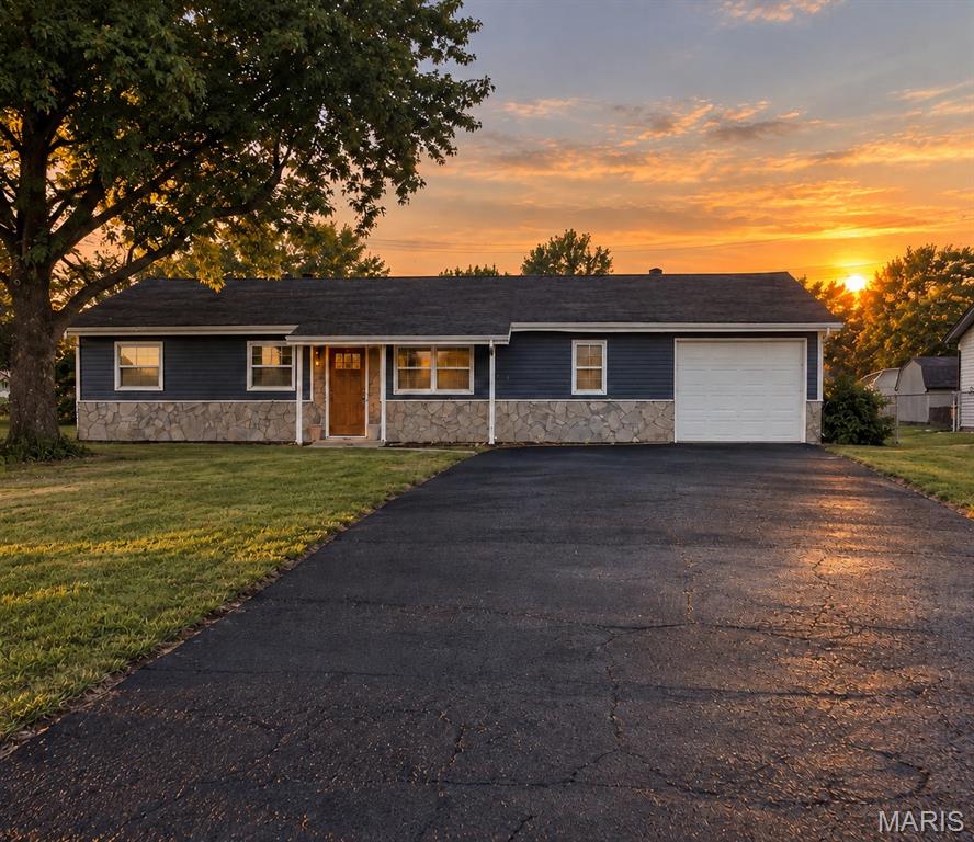 Welcome to 403 Prince Charles in O’Fallon! This beautifully renovated 3-bedroom, 2-bath home offers 1,225 sq. ft. of updated living space with a clean, modern finish throughout.

The kitchen features high-quality cabinetry, new countertops, updated fixtures, and a fresh design that flows seamlessly into the main living areas. A newly created mudroom adds valuable everyday functionality with a dedicated space for shoes, coats, bags, and storage as you come and go.

Both bathrooms have been completely updated, including a standout primary bath featuring marble tile and a beautifully finished guest bath with new tile and fixtures. Nearly every detail inside has been refreshed, giving the home a true move-in-ready feel.

Major exterior improvements include a new roof, new siding, and a brand-new patio perfect for relaxing or entertaining. The property also includes an attached 1-car garage and a functional layout that makes excellent use of the space.

With extensive updates inside and out, 403 Prince Charles offers the look and feel of a new home without the new-construction price tag. Schedule your showing and see everything this O’Fallon home has to offer!