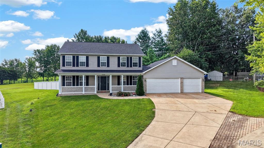 If you've been searching for a private, fully fenced backyard on nearly .5 acre with a HUGE oversized 3 car garage, this is the one! Located in the sought after Lake Chateau Estates, this home offers access to a neighborhood lake known for excellent fishing, all within walking distance of the Warrenton Aquatic Center and just minutes from Hwy 47 and I 70.

Step inside to a bright and spacious entry foyer with newly installed luxury vinyl plank flooring flowing throughout the main level. The kitchen features granite countertops, tiled backsplash, stainless steel appliances, and a breakfast bar overlooking the open dining area and large living room with wood burning fireplace. Just off the kitchen you'll find a separate formal dining room along with an additional living space perfect for a home office, playroom, or sitting room.

Upstairs, the expansive primary suite offers plenty of room to unwind with a dual vanity, separate tub, walk in shower, and walk in closets. 3 additional spacious bedrooms and a full bathroom complete the 2nd floor.

The partially finished lower level adds even more flexibility with 2 finished rooms ideal for a home office, gaming room, gym, hobby space, or additional sleeping area for guests.

Then step outside to the backyard buyers spend years searching for. Nearly .5 acre of private, fully fenced space gives you plenty of room for kids, pets, entertaining, or simply enjoying your own outdoor retreat. The oversized patio with retractable awning creates the perfect setting for summer barbecues, gatherings with friends, or quiet evenings at home.

With a rare combination of space, privacy, location, and an oversized 3 car garage, this Lake Chateau Estates home truly stands apart. Don't let this opportunity slip away. Schedule your private showing today!