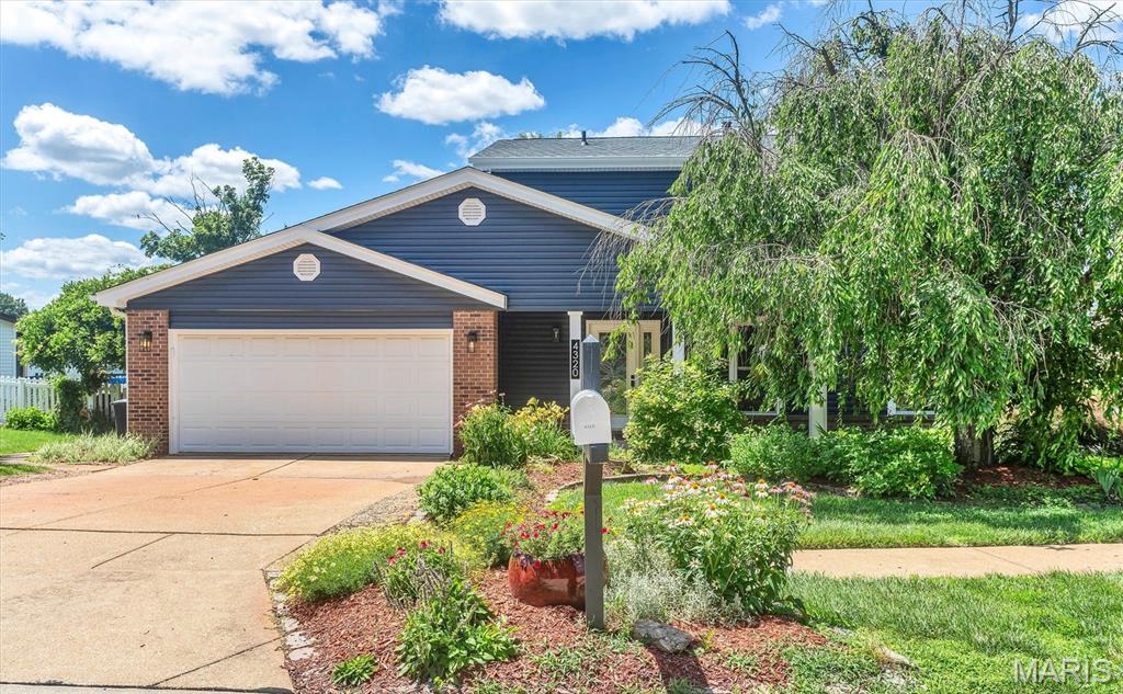 BEST VALUE in South County: Classic two-story w/NEW siding & roof ('26) has two-car attached garage. Large kitchen w/new stainless appliances; including new dishwasher & built-in microwave and has plenty of cabinets & counter space. Breakfast room w/bay window opens to family room w/wood floors & door to back yard.  New updated lighting. Separate formal dining room to oversized (17x12) living room. Three full baths w/new cabinets, including main floor bath w/shower. New windows & outside doors. Refinished wood floors. Panel doors. Walk-in closet(s). Full basement has 1000+ square feet for excellent storage, hobby/workshop & future-finish potential. Neutral paint & carpeting. Attractive stone front w/covered front porch. Sprinkler system. Curved landscaping lines .26-acre lovely, fenced yard w/covered patio & perennial gardens. Conveniently located near HWY 55 in the Mehlville school district.