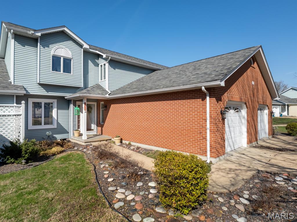 This esquite Condo is overlooking the sparkling Lake and the Golf Course allowing for critiquing the golfers, cool evening breezes to give a spectacular sunset where you will see the Deer come out to graze on manicured greens.  It is a breathtaking view from the covered back deck and the house through the window in the master to the French Doors in the living room.  This delightfully decorated Condo has 3 large bedrooms and 2 baths.  A handy finished garage goes immediately into the this well equipped kitchen with a Breakfast nook.  On to the living room overlooking the Golf Course too then to a pleasantly selfish Master Suite with access to the Covered Deck, Walk-in Closet and the Bathroom + laundry room too it's just easy living.  There is also a Dining Room area between the kitchen and Living Room for those celebration times.  Upstairs, you will find 2 nice big bedroom and a full bath.  This Condo is so well developed and the grounds are beautiful with meandering concrete paths to easy walk viewing the delightful landscape. This is ease living with the Association attending to just about everything on the outside.  Water and Sewage is also included in the month dues.  Wonderful neighbors await to greet you, come on and take a peek, this will not last forever.