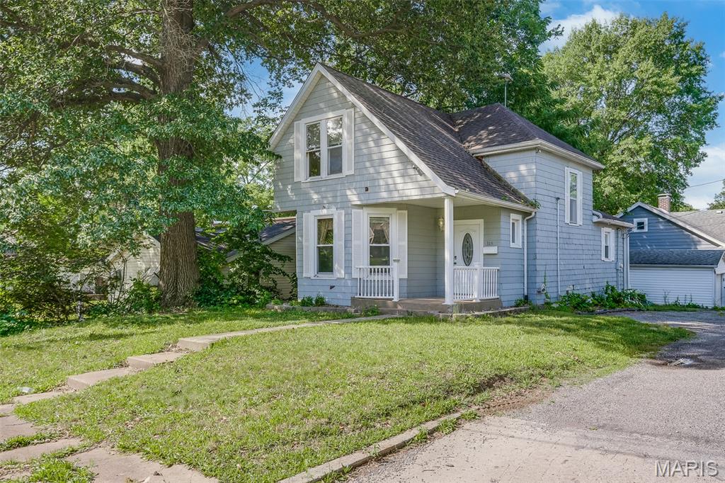 Welcome home to this charming 3-bedroom, 1-bath property filled with character and functionality. The bright and inviting living room features abundant natural light from numerous windows and a cozy gas fireplace, creating the perfect gathering space. The spacious, updated kitchen offers plenty of room for cooking and entertaining and includes a working dishwasher and garbage disposal.

The home features a convenient main-floor bedroom, while two additional generously sized bedrooms are located upstairs. The main-floor laundry adds to the home's practicality.

Outside, you'll find a privacy-fenced backyard complete with a storage shed and off-street parking. Offering great space, comfort, and potential, this home is being sold as-is and presents a wonderful opportunity for homeowners and investors alike.

Buyer to independently verify all MLS information, including but not limited to square footage, room measurements, lot size, taxes, and school district.