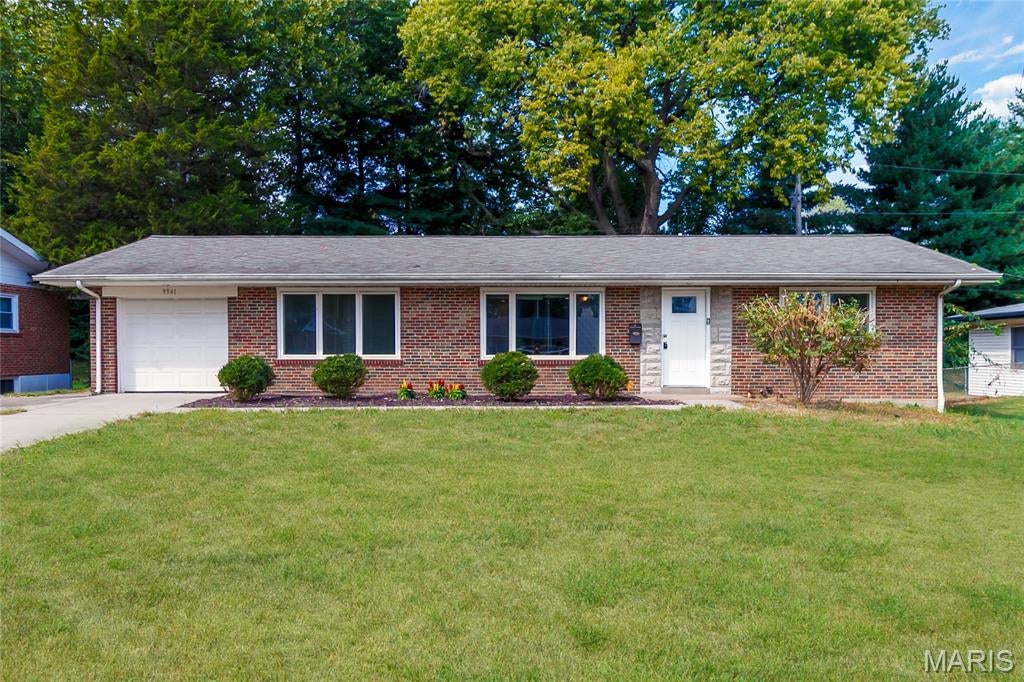 Welcome to 9941 Norwich! This unique and inviting 4-bedroom, 2-bathroom home in Bellefontaine Neighbors offers character, comfort, and plenty of space. Beautiful hardwood floors flow throughout much of the home, creating a warm and timeless feel. The spacious kitchen features a beautiful center island, providing the perfect gathering spot for family and friends. One of the four bedrooms is currently designed as a private theater room, complete with reclining theater chairs—an ideal space for movie nights, entertaining, or relaxing at home. The basement offers an extremely large storage room, providing abundant space for seasonal items, hobbies, or additional storage needs. A newer roof, newer hot water heater and HVAC system adds peace of mind, while the attached garage provides convenient parking. Outside, enjoy the fenced-in yard, perfect for outdoor activities, gardening, pets, or entertaining. An added bonus: the home can be sold with the furniture included, making this a convenient opportunity for a buyer looking for a move-in-ready home with furnishings already in place.
Don’t miss the opportunity to make this one-of-a-kind Bellefontaine Neighbors home your own!