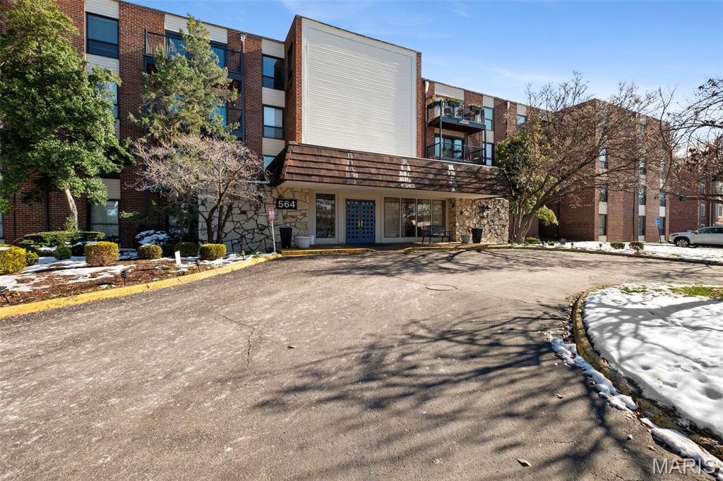 Continue to show ...Amazing view from  this 4th floor unit overlooking the golf course with endless possibilities!  Spacious and ready for a new owner's personal touch this unit offers a secure building with underground parking [this unit is one of the few in the building that has two parking spaces # 14 and 15] nestled in the heart of Creve Coeur!  Versatile commutes and conveniences of all sorts nearby! Immediate occupancy.  Separate entry foyer leads into spacious living/great room space with yet a separate formal dining area off the kitchen!  Enjoy private views from the deck off the great room!  Beyond the dining room is a cozy den/family room with shelving.  Two full baths service the two bedrooms [one bath offers a tub shower combo and the other bath offers double vanities with shower only] and a hall guest 1/2 bath add versatility to this sought after open floor plan with strong natural light!  The kitchen offers amazing storage within the ample cabinet space! Utility room offers washer and dryer spaces as well as plenty of storage space/shelving! .  Plenty of guest parking in front and a community pool for residents to enjoy!  Property to be conveyed 'as is"