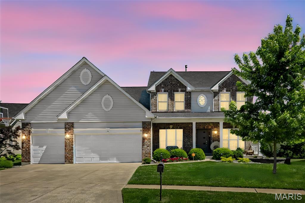 Impressive and stylish both inside and out, this beautifully updated residence showcases designer finishes and thoughtful details throughout. From the moment you enter, you’ll appreciate the hardwood floors, plantation shutters, 9-foot ceilings, upgraded lighting, custom closets, and inviting, open feel.  The welcoming foyer is flanked by formal living and dining rooms and leads seamlessly into the main floor family room, highlighted by a striking accent window wall and gas fireplace—perfect for everyday living and entertaining.  The modernized kitchen is a true standout, featuring a large center island, custom cabinetry, coffee bar, walk-in pantry, and generous workspace. It connects effortlessly to the adjoining laundry room and dedicated office area, offering both convenience and functionality. A turned staircase leads upstairs to an open loft space and four generously sized bedrooms. The primary suite is a relaxing retreat, complete with a vaulted ceiling, sitting area, custom walk-in closet, and a luxurious bath with soaking tub, separate shower, and dual vanities.  The finished lower level is designed for entertaining, offering a media room with a popcorn bar, full bath, spacious recreation area with custom wet bar, and ample storage space. Step outside to your private backyard oasis offering true privacy and unlike others —perfect for gatherings or quiet evenings—featuring a covered deck, patio areas, outdoor kitchen, fire table and hot tub.  Additional highlights include a 3-car garage, dual HVAC systems, sprinkler system, and super convenient location in the highly sought-after Rockwood School District with easy access to Highways 141, 44, and 270. And the school bus stop is just at the corner!  This exceptional home offers the perfect blend of comfort, style, and functionality and has an abundance of upgrades and features compared to other recently sold homes in the area.  An amazing value —ready for you to move in and enjoy.