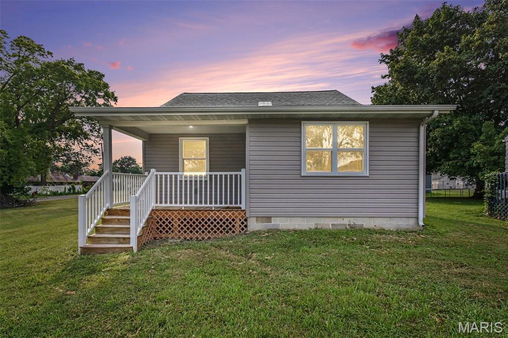 Practically brand new from the studs up! This beautifully rebuilt 3-bedroom, 2-bath home offers the peace of mind of nearly everything being less than two years old. Enjoy a stunning kitchen featuring beautiful countertops, stainless steel appliances that are less than a year old, and plenty of space for cooking and entertaining. Vinyl flooring flows throughout the home, creating a modern, low-maintenance finish. The spacious primary suite upstairs is a true retreat with a large Jacuzzi tub, perfect for relaxing after a long day. Convenient main-floor laundry adds to the home's functionality. Major updates include a new roof, HVAC system, hot water heater, windows, and so much more-allowing you to move in with confidence. Situated on a desirable corner double lot, this property offers extra outdoor space and endless possibilities for entertaining, gardening, or future improvements. Don't miss your opportunity to own this completely renovated home where all the hard work has already been done!