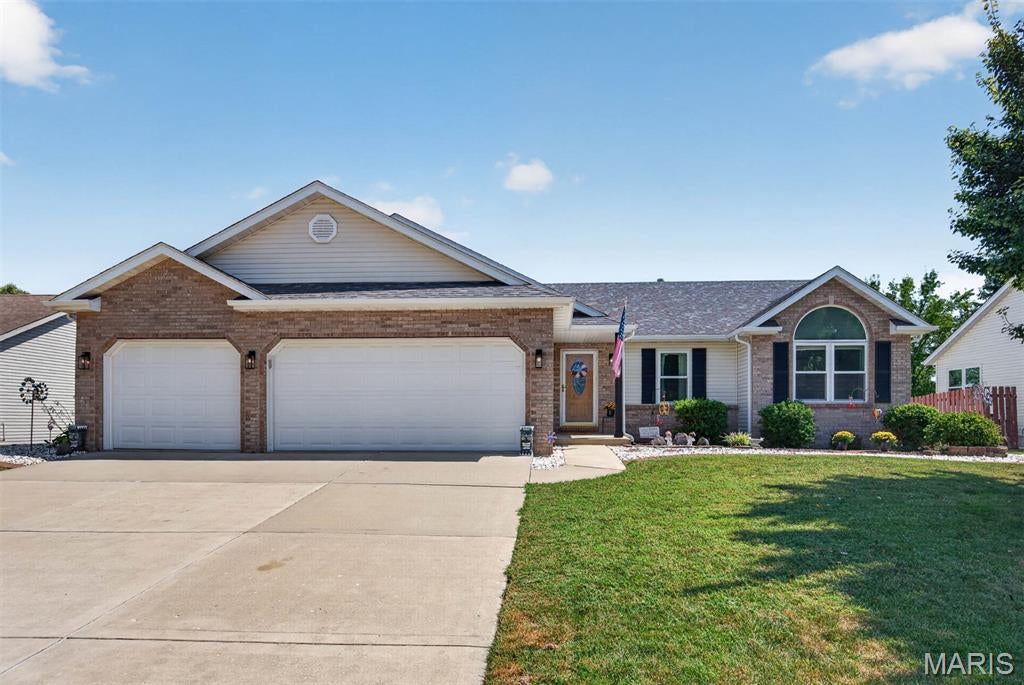 Welcome to this exceptionally maintained ranch style home in the desirable Meadowbrooke neighborhood. Step into the spacious foyer featuring glistening hard wood flooring that extends the hall and great room, highlighted by vaulted ceiling and gas fireplace. The kitchen offers stainless steel appliances, pantry, and a breakfast area that opens onto the backyard deck. Convenient main level laundry with washer and dryer included. The primary suite includes a walk-in closet, double vanity, jetted tub and separate shower and private access to the the second deck.  The lower level recreation area with wet bar refrigerator and pool table create an inviting space for gathering with family and friends You'll also find a bonus room and flexible space for a home office, play room, or workout area and a storage room with cabinets, shelving, and dual sump pump with alarm. The hobbyist will enjoy two workshop spaces, one in the three-car garage and another at the rear of the property in the 16 x 10 shed. Come experience the comfort and care throughout this beautifully maintained home