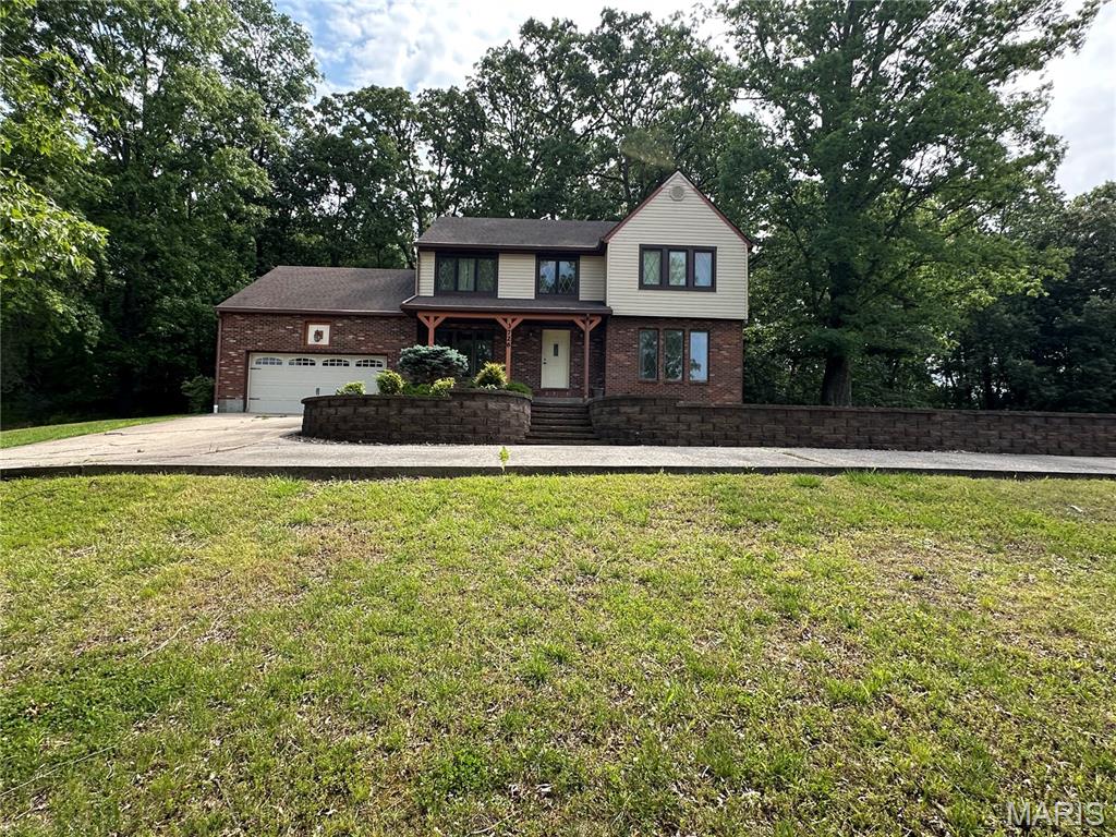 Welcome to 3726 Old Hopper Road!  This well-cared-for two-story home is nestled on approximately a half-acre wooded lot, offering both privacy and a peaceful setting.  Featuring 4 bedrooms and 3.5 baths, this home has been thoughtfully updated with a new roof, fresh interior paint, new carpet throughout the entire upstairs and portions of the main level, plus many additional improvements (see attached updated list).
The inviting living spaces are perfect for everyday living and entertaining.  Cozy up by the fireplace on cool evenings or unwind with your favorite summer beverage on the private patio beneath the pergola while enjoying the tranquil wooded backyard.
The finished lower level adds valuable living space with a spacious family room, a full bath, and abundant storage.  Combining comfort, updates, and a beautiful natural setting, this home is move-in ready and waiting for its next owner!