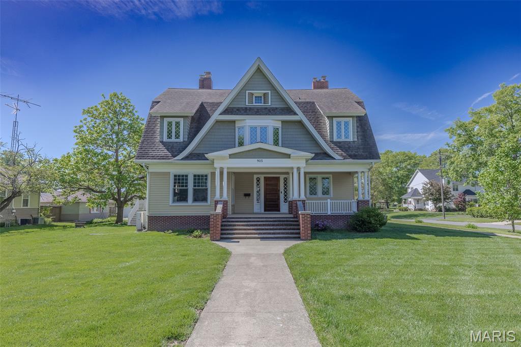 Step into timeless elegance in this stunning 4,100 square foot Victorian home, beautifully enhanced with modern upgrades. The home was completely renovated in 2014 with updates that maintain the home's architectural integrity. Enjoy quarter sawn original oak floors, 3 claw foot tubs, a spacious 5-bedroom layout, and a gourmet 18x15 kitchen featuring quartz countertops and a walk-in pantry. Cozy up by any of the 3 fireplaces or park with ease in your heated 34x30 3-car garage. Classic charm meets today’s comfort—your dream home awaits!