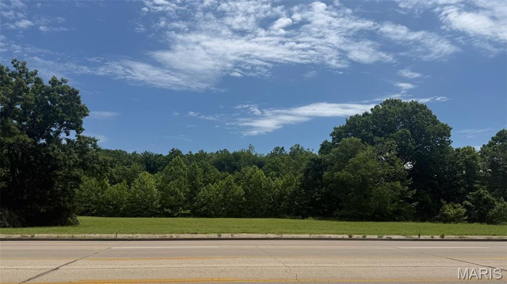 PERFECT LOCATION FOR COMMERCIAL DEVELOPMENT! BUY the full 7 plus acres OR the Sellers have a proposed plan to divide into three great commercial lots to better suit smaller commercial needs. PLEASE SEE the attached proposed plat with three fantastic commercial lot options.  This acreage along Mount Auburn Road would provide your business with unbelievable visibility! It has excellent road frontage and traffic count, and would be perfect for professional offices, retail, or even a well-placed convenience store. Zoning is currently C-1 but it can potentially be re-zoned to residential multi-family.