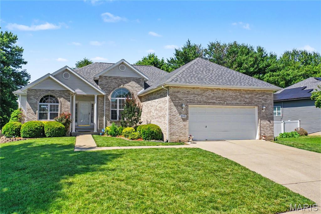 Fall in love with a home where comfort, space, and peace of mind come together. Nestled in desirable High Valley Lake Estates, this beautifully maintained ranch offers over 3,400 square feet of finished living space designed for both everyday living and effortless entertaining. With occupancy permit approval already secured and major updates completed, you can move in and start enjoying your new home from day one.

From the moment you step inside, you'll be welcomed by an open-concept floor plan filled with natural light, soaring vaulted ceilings, rich hardwood flooring, and inviting spaces that instantly feel like home. Whether you're hosting holiday gatherings, celebrating special occasions, or simply enjoying a quiet evening with family, the seamless flow between the living room, dining area, and kitchen creates the perfect setting.

The kitchen blends style and functionality with granite countertops, abundant cabinetry, updated ceramic tile flooring, and modern appliances. It's a space designed for everything from busy weekday mornings to entertaining friends and family.

The desirable split-bedroom floor plan offers privacy and flexibility. The spacious primary suite serves as a relaxing retreat, featuring hardwood flooring, a walk-in closet, and a private bath with double vanities, upgraded tile, and a Jacuzzi tub perfect for unwinding at the end of the day. Two additional bedrooms and a full bath complete the main level.

The finished walk-out lower level provides exceptional versatility with a large recreation or family room, fourth bedroom, full bath, and generous windows that keep the space bright and welcoming. Whether you need guest accommodations, a home office, workout area, hobby room, or additional living space, this level easily adapts to your lifestyle.

Step outside and enjoy your own private backyard retreat. Mature landscaping, excellent curb appeal, and a walk-out patio create the perfect backdrop for morning coffee, evening conversations, or weekend barbecues with family and friends.

Recent improvements include:

• NEW HVAC System with 4-Ton A/C (2026)
• NEW Roof (June 2025)
• Granite Countertops (2024)
• Updated Kitchen & Guest Bath Flooring (2025)
• Hot Water Heater (2024)
• Microwave (2025)
• Dishwasher (2022)

Located within Whiteside School District 115 and Belleville East High School boundaries, you'll enjoy convenient access to shopping, dining, parks, major highways, and Scott Air Force Base.

The roof is new. The HVAC is new. The occupancy permit has already been approved. All that's left is to bring your furniture and make it yours. Combining generous living space, thoughtful updates, and a sought-after location in High Valley Lake Estates, 2645 Katrine Lake Drive is ready to welcome you home