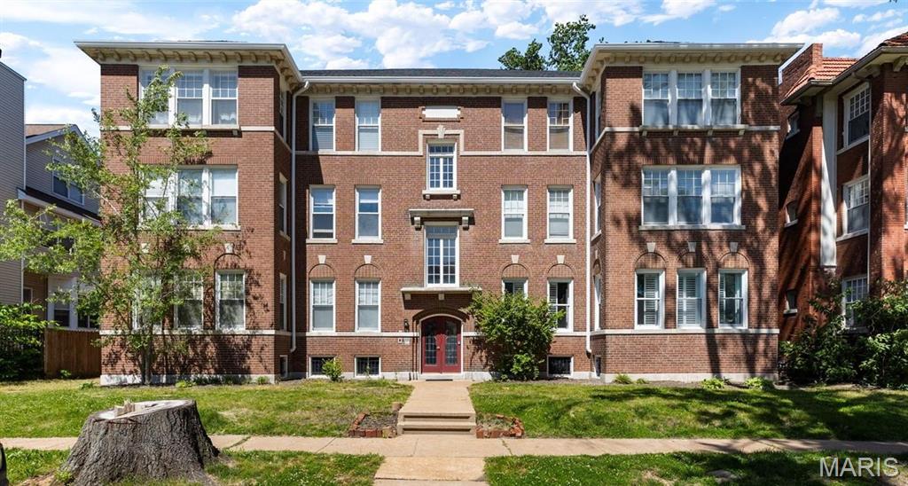 Bright, spacious, and perfectly positioned in the heart of one of St. Louis’ most connected neighborhoods, this 2-bedroom, 2-bath condo offers the ideal blend of comfort, convenience, and city living. Step inside to hardwood floors that carry throughout the main living spaces and a layout that flows with intention. The living room centers around a cozy fireplace, creating a warm and inviting focal point, while oversized windows fill the home with sunlight and neighborhood views. Just beyond, the dining area connects seamlessly to the kitchen, where generous cabinetry, stainless steel appliances, and ample prep space make both everyday living and entertaining feel effortless.  From the kitchen, you have access to your own private balcony.  The primary suite includes a private bath and a walk-in closet, while the second bedroom offers flexibility to suit your needs. With the added convenience of in-unit laundry, dedicated basement storage, and gated, covered parking, everyday living feels just a little bit easier.  What truly sets this home apart is the lifestyle and location that surround it. Set in a car-optional neighborhood with access to three MetroLink stations and situated along the WashU Shuttle Route, this condo offers exceptional convenience and connectivity. The neighborhood is also included in Washington University’s Live Near Your Work loan program, adding even more value to an already desirable location. Beyond the everyday ease of the area, the neighborhood itself is filled with energy, character, and community. Enjoy close proximity to BJC Medical Center, Forest Park, The Delmar Loop, and neighborhood favorites like the Levitt VIBE STL Music Series at Philip Lucier Park, Greg Freeman Park, PorchFest, and many other local events and traditions that make this corner of St. Louis vibrant, connected, and uniquely its own.  Come out and see us at our OPEN HOUSE on Saturday, May 16th, 12pm-2pm.
