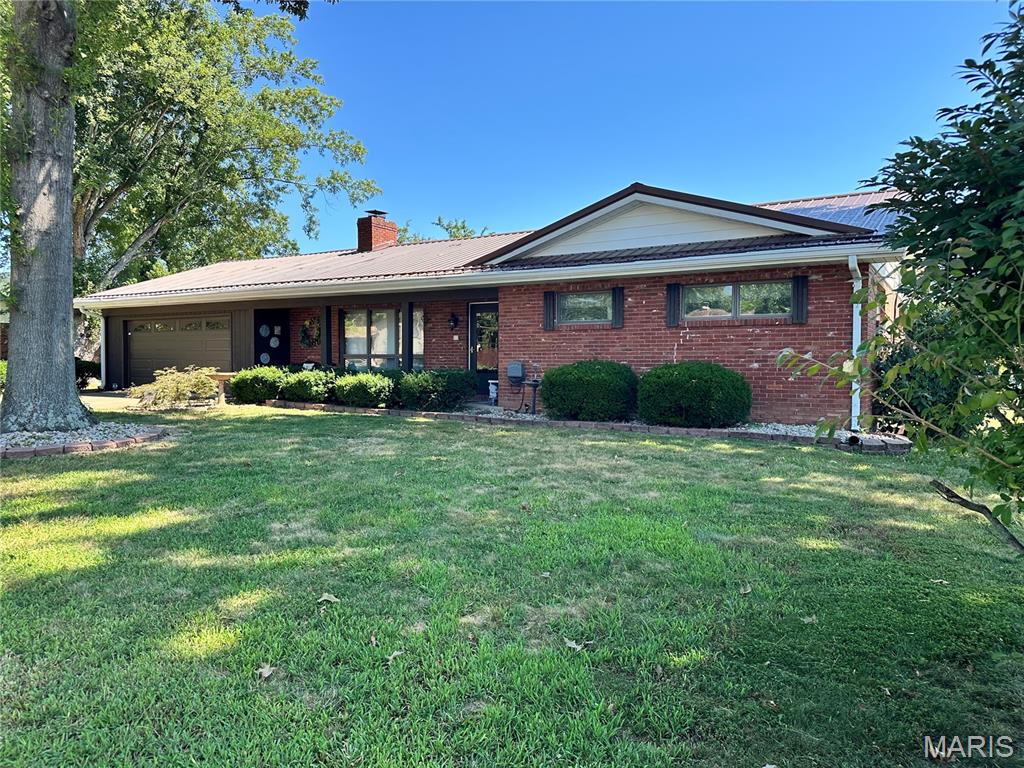 Welcome to this well-maintained 3-bedroom, 2-bathroom home located on Fairlane in Ironton, Missouri. This home has seen several updates over the past couple of years, including fresh paint, and also features a Generac system for added peace of mind. Inside, you'll find plenty of storage with lots of closets throughout the home. One of the highlights is the beautiful all-season room overlooking the fenced backyard, offering a great space to relax or entertain year-round. Enjoy the unique setting of having the Arcadia Valley Lions Club Fairgrounds right in your backyard! Additional features include a storage shed and spacious 2-car attached garage, providing even more room for vehicles, tools, and outdoor equipment. Conveniently located just a short drive from downtown Ironton and Shepherd Mountain Bike Park, this home is also close to many of the area's favorite attractions, including Battle of Pilot Knob State Historic Site, Johnson's Shut-Ins State Park, and Elephant Rocks State Park. A great opportunity to enjoy comfortable living in the heart of the Arcadia Valley!