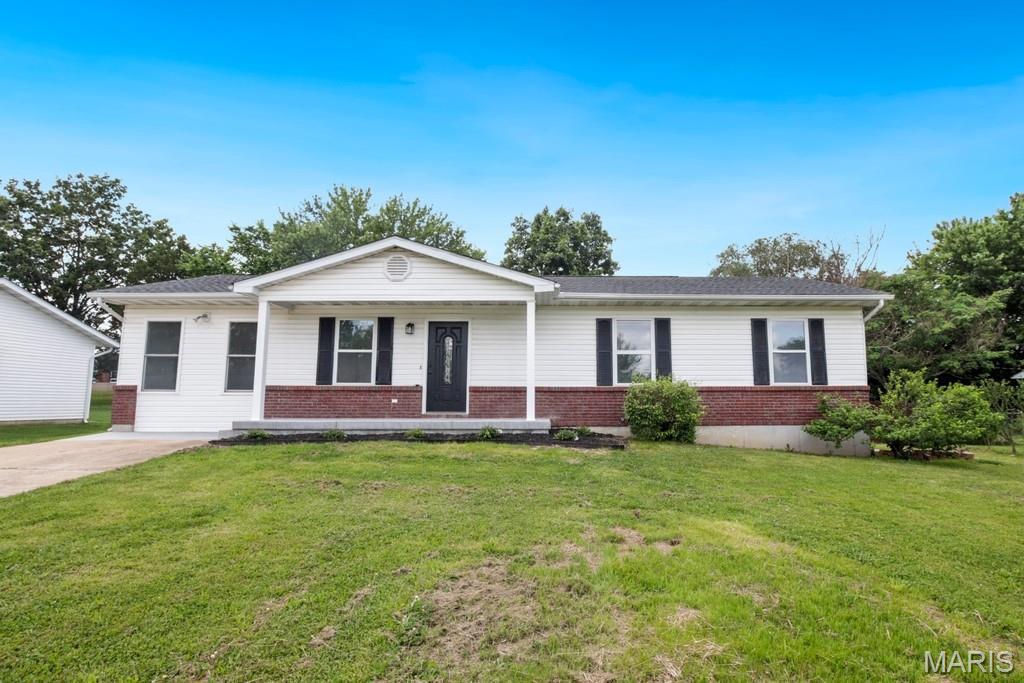 Completely remodeled in 2026, this 4 bedroom, 2 bathroom home offers quality updates throughout and a modern, move-in ready feel. Major improvements include a new roof, HVAC system, and concrete front porch, along with a full interior renovation featuring LVP flooring, updated light fixtures, new doors, fresh paint, remodeled bathrooms, and a fully updated kitchen with quartz counter-tops. The spacious primary suite includes a double vanity and walk-in shower, creating a comfortable private retreat. The basement offers a partially finished area that works great as an additional living room, game room, or entertaining space, with additional potential for future finishing. Outside, the backyard is fully fenced with a wooden privacy fence and includes a storage shed. Situated on a quiet street, this property combines extensive quality updates with functional living space both inside and out.