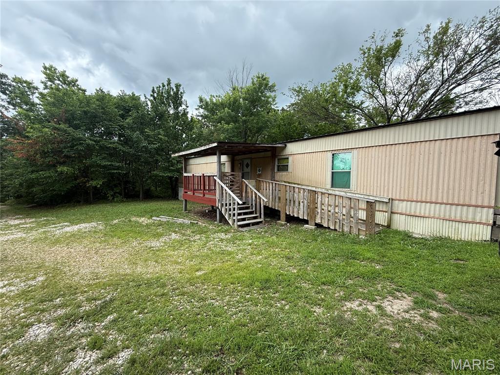 Enjoy the perfect blend of peaceful country living and everyday convenience with this charming 2-bedroom, 2-bath single-wide home situated on 2.48 scenic acres in the highly desirable Laquey School District. Nestled in a tranquil rural setting, this property offers ample space to enjoy the outdoors while remaining just moments from modern amenities.
Ideally located near a paved road with easy access to I-44, commuting is effortless. The property is also just minutes from the West Gate of Fort Leonard Wood, making it an excellent option for military personnel, civilian employees, or anyone seeking a convenient location with a country atmosphere.
Whether you're looking for a primary residence, investment opportunity, or a peaceful retreat, this property offers the best of both worlds—privacy, open space, and accessibility. Enjoy room to roam, garden, entertain, or simply relax and take in the beauty of rural Missouri living, all while staying close to shopping, dining, schools, and Fort Leonard Wood.
Country charm, acreage, and an unbeatable location—don't miss this opportunity!