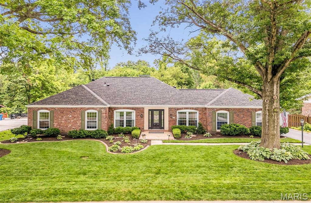 This is an INCREDIBLE Ranch home with an additional upper level bonus suite  AND a finished lower level.  This is like 3 homes in one.  Over 4500 Sq ft of living space.  This home is one story in the front and 3 stories in the rear. Come check it out! 
Main level has the Greatroom, Kitchen, Breakfast room, Dining Room, Formal Living room,  Primary Bedroom, Luxury master bath,  2 additional bedrooms, hall bath and office.  Upper level has the bonus suite with a large bedroom/living area, full bath, and walk in attic.   Finished lower level includes Rec Room,  Kitchenette,  full bath, media room, art room/den, workshop, gym, storage room, and more. 
Exterior has BRAND NEW Architectural ROOF, full brick on all 4 sides, vinyl siding on upper level suite, professional landscaping, inground sprinklers.  Then head to the backyard haven!  Inground pool, patio surround,  maintenance free deck, additional covered patio, fenced yard, tiered garden for flowers and vegetables.  
Other amenities include:  4 Bedrooms, 4 full baths, two decorative fireplaces, dual hvac, hardwood floors, gourmet kitchen, 42 inch custom cabinets, center island, solid surface countertops,  additional cabinets in the breakfast room.   
The Master Suite and Bath are AMAZING!  The master bath has been remodeled to include an enlarged tiled shower, dual gentlemen height sinks, and across the hall is the walk in master closet the size of a bedroom. 
This home and yard are PRISTINE!  There is so much home here, let the pictures and video show you what is so hard to describe in words.  You will love this home!

AND......... take a double left past the home and you will find the community clubhouse and pool!!