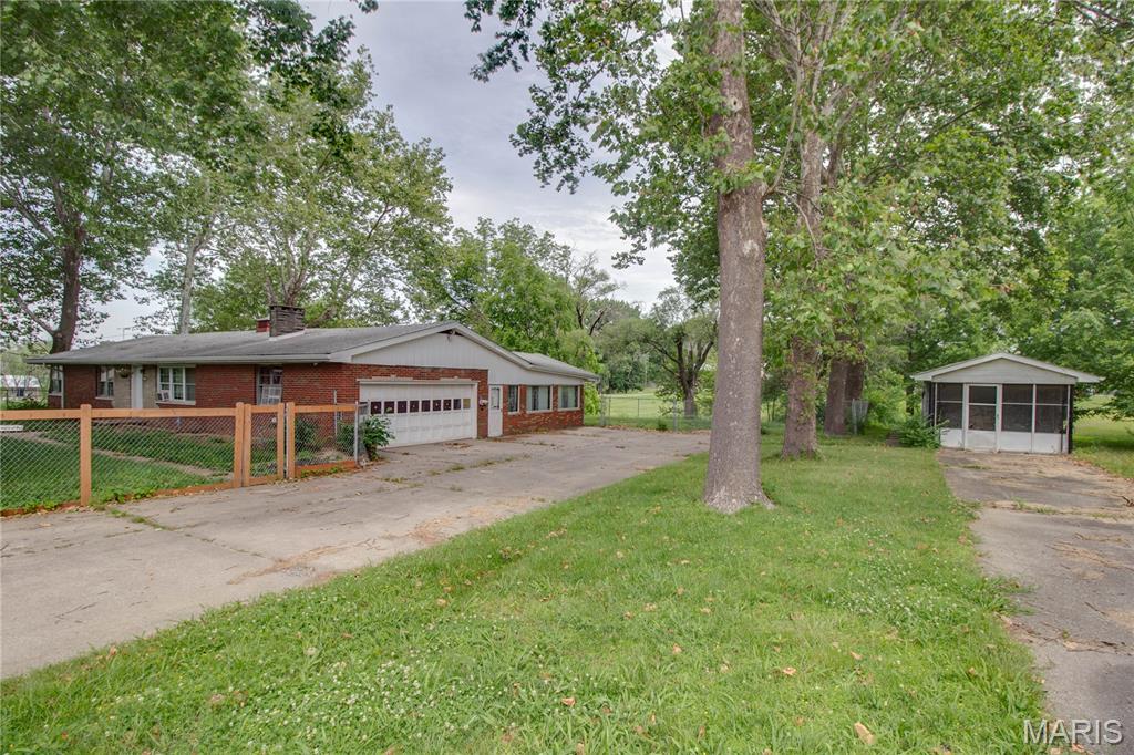 Looking for a spacious property conveniently located in Cottage Hills ??? ..... Look no further than 427 Ruth Avenue. This 3 bed ranch is nestled on over an acre. This home has had some recent updates with flooring, fresh paint, plumbing upgrades and a recently water proofed basement. This property offers an additional two car garage and another screened in building that could be great for storage or entertaining.