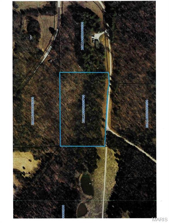 Here are 5.8 +/- acres right outside of town and not far off of Hwy 44. Full of wildlife and a mix of  mature trees. Check it out for yourself!