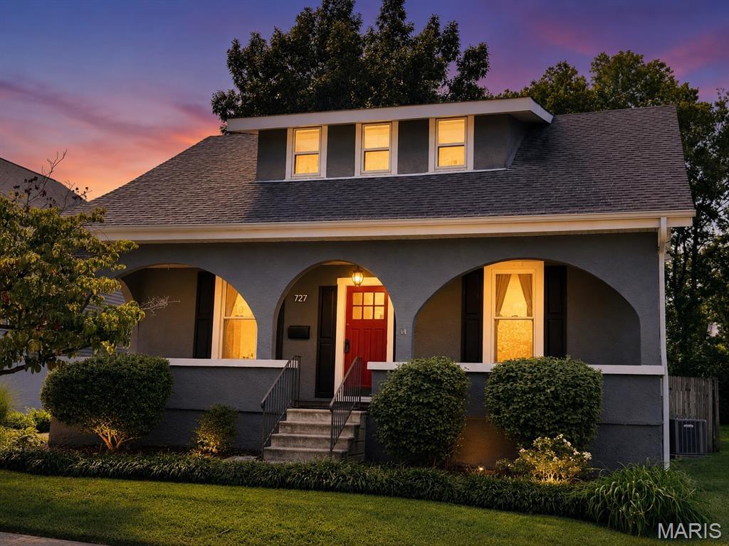 Warning: this 103-year-old cottage in Kirkwood is about to steal your heart! The full-width covered front porch is like a big ol' hug from your favorite aunt - it's just begging you to sit back, relax, and watch the world go by! The sun-drenched living room is the perfect spot to throw those epic parties that'll be the talk of the town (and the 'gram). Through an archway your soon-to-be legendary dinner parties will commence and be the talk of the neighborhood. And don't even get me started on the galley kitchen - it may be small, but it's packing some serious punch with all those cabinets, counters, and fancy appliances! The breakfast area is like a bonus room (hello, home office or reading nook!) and the family room is basically the coziest spot on earth with its wall of windows, gas fireplace, and easy-peasy flooring. And let's not forget the half bath - because, let's be real, it's all about the little things in life. Upstairs, you'll find three spacious bedrooms with hardwoods and neutral paint (because who doesn't love a good blank canvas?) and an updated guest bathroom. The level and fenced backyard is basically a doggone paradise (or a kiddo's dream come true), and the oversized two-car garage is like the cherry on top of this Kirkwood charm sundae. So, if you're tired of the same old boring homes, come on down to 727 and get ready to fall head over heels for this old-world charmer! The only thing missing here is YOU!!!