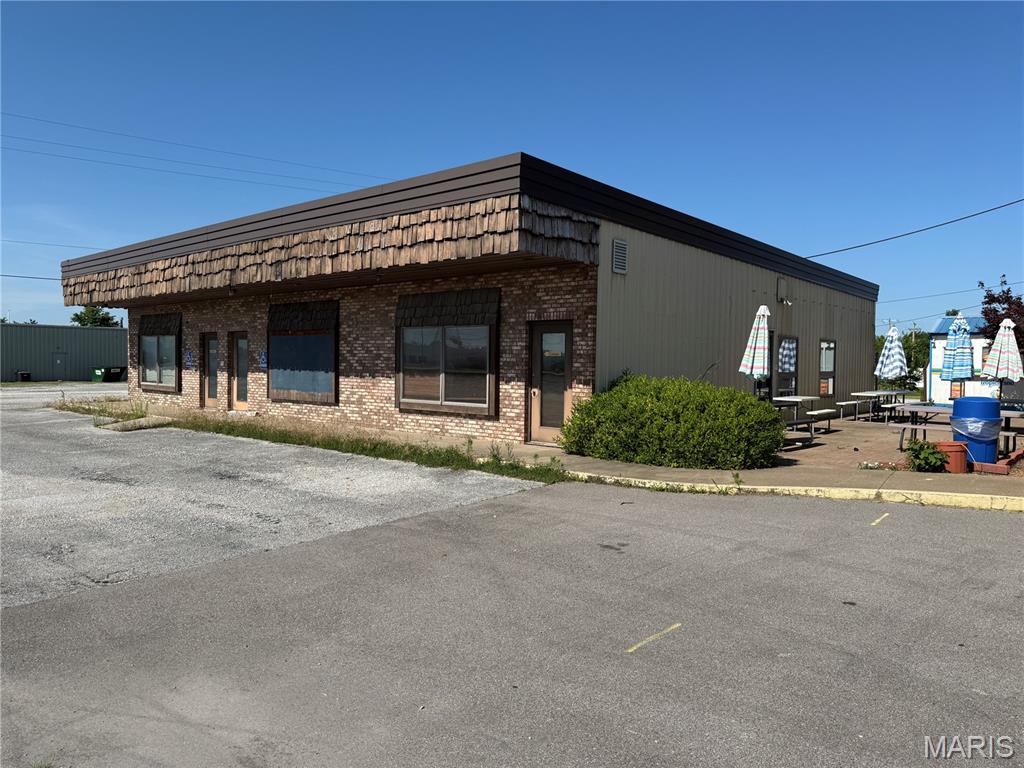 Unlock the potential of this versatile 0.43-acre commercial lot featuring high visibility and convenient highway frontage. Its prime location ensures excellent traffic exposure and easy customer or client access, making it a standout choice for professional office space. The property is also located within a Tax Increment Financing (TIF) District, offering potential financial incentives for qualifying development projects. Whether you're launching a new firm, expanding your practice, or establishing a satellite location, this site offers exceptional visibility and flexibility. With potential for modern office layouts, shared workspaces, a salon, studio, or even boutique retail, the property adapts to a wide range of commercial uses. The layout is flexible and well-positioned to support a professional, creative, or service-oriented business. This is a valuable opportunity for entrepreneurs and investors seeking a highly visible, easily accessible site to grow their business footprint.