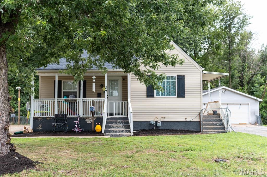 Charming, inviting, and full of potential, this 2-bedroom, 1-bath home in Lebanon is the perfect place to put down roots. Whether you're a first-time homebuyer, looking to downsize, or searching for an investment opportunity, this well-maintained property offers comfort, character, and everyday convenience.

Step inside to discover beautiful hardwood flooring that adds warmth and timeless appeal throughout the living spaces. The eat-in kitchen provides a welcoming spot to gather for morning coffee, family meals, or casual entertaining, with plenty of room to make it the heart of the home.

Enjoy relaxing on the covered front porch, where you can unwind after a long day or greet neighbors in this established community. Out back, the fenced yard offers a private space for pets, gardening, play, or weekend cookouts, making it easy to enjoy the outdoors.

The unfinished basement provides valuable storage space and the flexibility to create a workshop, hobby area, or additional living space as your needs evolve. With a practical layout and room to personalize, this home is ready for its next chapter.

Conveniently located near shopping, restaurants, schools, and everyday amenities, you'll enjoy the perfect balance of small-town charm and accessibility. Don't miss this wonderful opportunity to own an affordable home with lasting appeal. Schedule your private showing today and see all this Lebanon gem has to offer!
