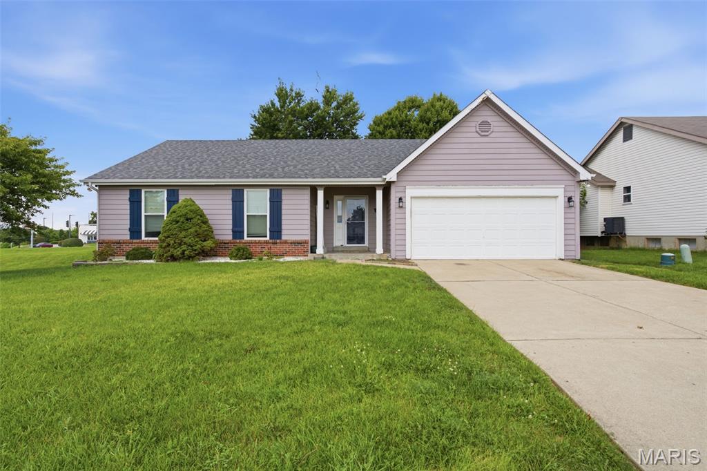 Welcome home to this well-maintained 3-bedroom, 3-bath ranch offering comfortable living, functional space, and a layout designed for everyday enjoyment. Purchased by the current owners earlier this year, an exciting out-of-state career opportunity has created a rare chance for a new buyer to call this wonderful home their own.

Step inside to an open-concept floor plan featuring a spacious great room with vaulted ceilings and a cozy wood-burning fireplace, creating the perfect gathering space for relaxing or entertaining.

The kitchen is equipped with a pantry, stylish backsplash, and a sunny breakfast area with sliding glass doors that open to the backyard patio—ideal for morning coffee, weekend barbecues, or entertaining guests. The fully fenced backyard offers privacy and plenty of space to enjoy the outdoors.

The primary suite provides a peaceful retreat with a walk-in closet and private en-suite bath. The finished lower level expands your living space with a large family room, bonus sleeping area, full bath with a whirlpool tub/shower combination, oversized walk-in closet, laundry area, and abundant storage complete with built-in shelving.

Conveniently located with quick access to Highways 40/64 and 364, this move-in-ready home offers the perfect blend of comfort, space, and convenience. Opportunities like this don't come along often—don't miss your chance to make it yours!