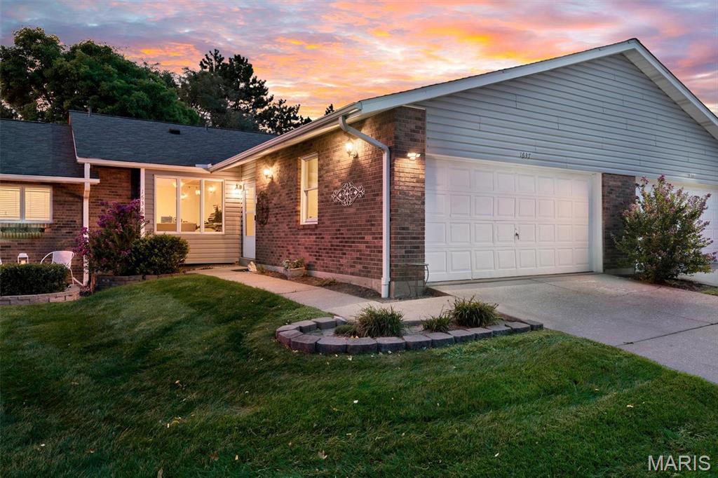 Maintenance Villa living with a neighborhood POOL, tons of space and an HOA that takes care of so much! You may find that friends and family suddenly want to visit a little more often when summer rolls around. The community pool and clubhouse are just part of what makes this Forest Hills villa such an easy place to call home. The current owners have loved it here, but after only a year, they're moving to be closer to family—their loss is the next owner's gain!

The $385/month HOA covers ALOT—including the community pool and clubhouse, water, sewer, trash, roof, lawn/grounds and common-area maintenance, snow removal, and parking/road maintenance. The home is all electric, and the sellers' homeowners insurance has been approximately $600/year, overall very low cost of ownership!! Major updates include a 2023 furnace and A/C, newer water heater and newer roof.

Inside, the main level is designed for easy living with a primary suite, second bedroom, two full bathrooms and main-floor laundry. The spacious living room feels bright and open with vaulted ceilings, skylights, crown molding, LVP flooring and fireplace. Step outside to your private patio and enjoy the serene backyard.  There's an attached 2-car garage as well.

The kitchen features abundant custom cabinetry with roll-outs, stainless steel appliances and plenty of storage. Downstairs, the amount of additional space may surprise you. The huge family room is approximately 30' x 16', plus there's a third full bathroom, a bonus room/office ready to be used however you choose, and a separate utility room/workshop.

Location is another huge advantage. You're tucked into an established neighborhood while still being just minutes from Walmart, Zumbehl Road and I-70, with shopping, restaurants and everyday conveniences close by. Main-level living, a neighborhood pool, private patio, huge finished family room, bonus space, workshop/storage and an HOA that handles much of the exterior upkeep —there's a lot to love here.