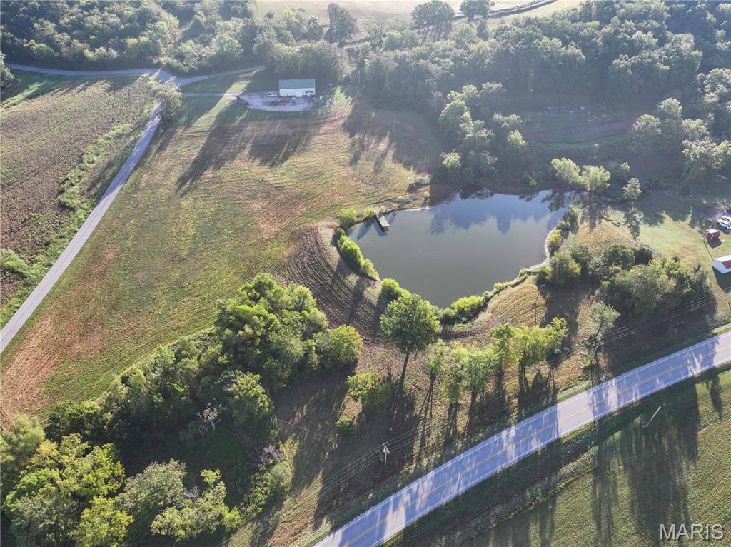 Rare opportunity to own a versatile country property in the Oak Ridge School District! Located at 304 County Road 506 in Cape Girardeau County, this property offers rolling hills, multiple ponds, excellent hunting opportunities, and numerous potential building sites.

The property features a unique shop-style home overlooking a pond, providing a peaceful country setting with a great view. A second home is also located on the property and is currently vacant. The second home is being sold strictly AS-IS, giving the new owner an opportunity for renovation, additional living quarters, rental potential, or other uses.

Outdoor features are a major highlight, with three ponds total, rolling terrain, wooded and open areas, and excellent habitat for deer and other wildlife. Multiple attractive building sites are located throughout the property, with electric already running through the property. Both a well and public water are available.

Dead-end County Road 507 runs through and splits the property, providing convenient access to different portions of the acreage while maintaining a quiet, rural setting.

Whether you're looking for a private country residence, recreational and hunting property, additional building sites, or a property with room for multiple homes, this one offers plenty of possibilities. Located in Cape Girardeau County and the Oak Ridge School District with a combination of improvements, utilities, water features, and beautiful Southeast Missouri terrain.