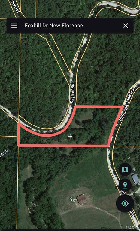 Mostly wooded 3.16-acre corner lot in a gated lake community with road frontage on Pinnacle Lake Rd and Skyline Drive. Ideal for building or enjoying as a private getaway. Mature trees, natural seclusion, and lake access nearby make this a great spot for recreation or a future homesite.