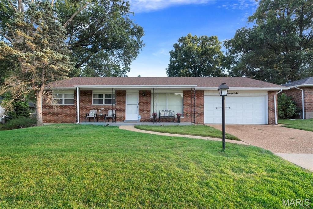 Welcome home to this charming full brick ranch with a covered front porch and plenty of space to make it your own! This inviting 3 bedroom, 2 full bath home offers a comfortable layout with recent updates throughout, including fresh paint, new kitchen appliances, select flooring, ceiling fans, and updates to the master bathroom featuring a new toilet, vanity, and vanity light.    

The living room and dining room combination features beautiful hardwood floors, which continue into all three bedrooms. A spacious family room provides the perfect place to relax, watch television, or gather with family and friends. The eat-in kitchen offers ample room for preparing meals and casual dining.

Need even more space? The finished basement provides valuable additional living area with endless possibilities.  It can be used as a home office, entertainment space, guest area, sleeping quarters, or whatever best fits your needs.  The basement also offers a laundry room and ample storage space.

Step outside to enjoy the covered rear patio, perfect for grilling, relaxing, or visiting with friends and family. The large, level backyard offers plenty of room for outdoor activities and gatherings. A convenient 2 car garage provides additional parking and storage.

With its brick exterior, spacious yard, finished basement, and recent updates, this home has so much to offer. The only thing missing is you!