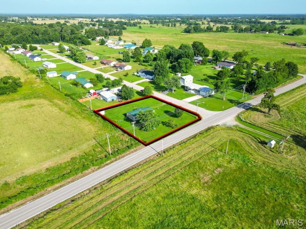 This level 0.54 acre corner lot offers a fantastic opportunity for builders, investors, or anyone looking to create a custom home within the city limits. With utilities already available on-site, much of the groundwork is in place to help get your project started. The existing home is uninhabitable and will need to be removed, making this an ideal blank canvas for new construction. Conveniently located near schools, shopping, dining, and everyday amenities, this property combines the benefits of city living with plenty of space to bring your plans to life. Property is being sold as part of a probate estate. No seller disclosures are available, as the owners have never occupied the property. Sold as-is.