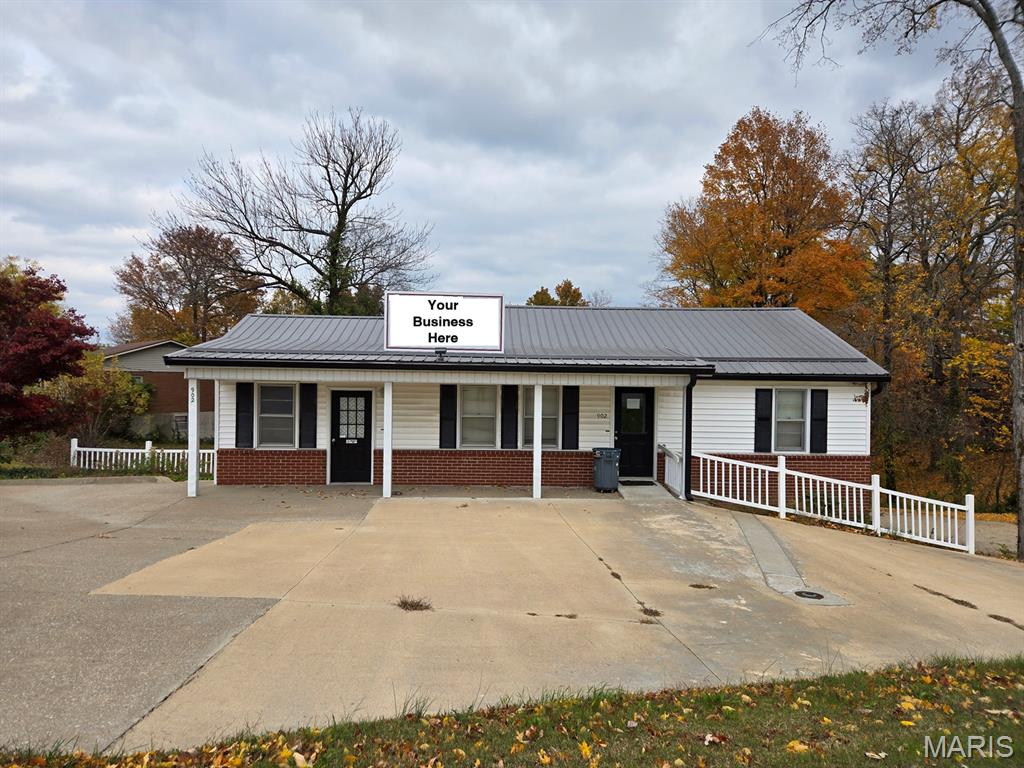 Located in the beautiful city of Jackson, Missouri, this fully furnished, two-level professional office building offers a rare opportunity to own your workspace while generating income by leasing the second level.

Perfectly suited for a salon, mental health counseling practice, legal office, medical use, or any professional service, this building is truly move-in ready—down to the furniture and high-end office equipment.

Main Level (Ideal Owner-Occupied Space)
* Welcoming reception area
* 4 private offices
* 2 conference rooms
* Bathroom
* Fully furnished, including desks, chairs, a conference table, a reception desk, bookshelves, and a high-end commercial printer

Lower Level (Income-Producing or Expansion Space)
* Separate private entrance
* Large reception area
* 4 private offices
* Spacious employee breakroom
* Bathroom
* Laundry/storage area

With excellent visibility on E. Jackson Blvd., this property is ideal for businesses seeking a professional image, easy client access, and room to grow.

The Smart Play
* Own your building instead of renting
* Lease the upper or lower level to offset your mortgage
* Use one level now and expand later
* Or lease both levels for a strong investment property

Whether you’re a business owner looking to stop throwing money away on rent or an investor seeking a turnkey professional building, this property delivers flexibility, functionality, and financial upside.