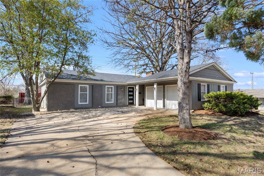 Welcome home to 7305 Berkridge Drive, where comfort, charm, and flexibility come together in one inviting space.
As you pull into the two-car garage and wide driveway, mature trees and a welcoming façade set the tone for what’s inside. Step through the front door and you’re greeted by warm hardwood floors and natural light flowing through the large windows, creating an atmosphere that instantly feels like home.
The living room centers around a cozy fireplace, the perfect place to unwind after a long day or gather with friends on a cool evening. Just beyond, the dining area, making it ideal for everything from weeknight dinners to holiday celebrations.
The kitchen brings personality and function together with striking cabinetry, stainless steel appliances, and generous counter space—ready for your morning coffee routine or experimenting with your favorite recipes.
Down the hall, you’ll find three comfortable bedrooms on the main level, including a relaxing primary suite with its own private shower bath. A second full bath featuring a jetted tub offers the perfect place to soak and unwind.
The home continues to impress downstairs with a partially finished lower level featuring beautiful acid-stained concrete floors—a unique and stylish touch that creates the perfect setting for a media room, game room, home gym, or creative workspace. With plenty of open space, it’s also ideal for working from home or designing a flexible lifestyle space.
Step outside and enjoy the spacious backyard, where the patio area invites summer barbecues, evening fires, or simply relaxing under the shade of mature trees.
Whether you’re buying your first home, working remotely, or simply looking for a place that blends comfort with character, this home offers the space and flexibility to fit your life.
Come experience the story of 7305 Berkridge Drive for yourself. Welcome Home!