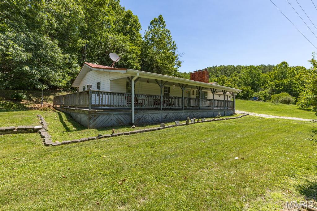 Looking for a full-time residence, weekend get-away or a short term rental (AirB&B) close to fishing or floating the Black River. Maybe you're into hunting or possibly recreation spots to investigate, there are several opportunities near by like Mark Twain National Forest, Elephant Rocks or Johnson's Shut-Ins State Park. This is an Estate Sale being sold. Seller has no information to provide and encourages buyer's to do their own inspections. Property includes two parcels so be sure to list both when making an offer. Tax ID# 02-7.2-035-000-000-005.0000 and Tax ID# 02-7.2-035-000-000-004.0000. Professional photos will be coming prior to going active.