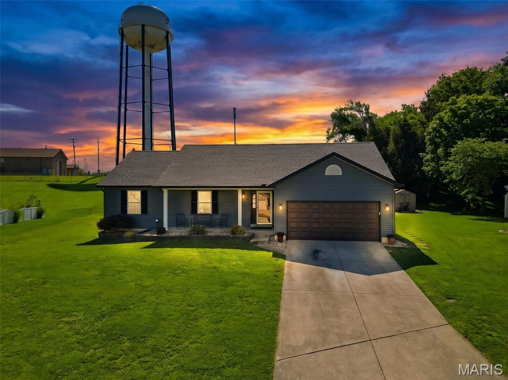 Welcome home to this beautifully maintained 3-bedroom, 2-bath ranch that perfectly blends comfort, style, and functionality. Step inside to find stunning cherry hardwood floors, a vaulted living room with a cozy wood-burning fireplace, and an inviting open floor plan ideal for everyday living and entertaining. The spacious kitchen and dining areas flow seamlessly into the main living space, creating a bright and welcoming atmosphere. Convenient main-floor laundry leads directly to the oversized garage, offering additional storage and workspace. The partially finished lower level expands your living options with a large rec room, a versatile sleeping room, and abundant storage space. Situated on a desirable cul-de-sac lot, the fenced backyard is designed for relaxation and enjoyment, featuring a covered deck, above-ground pool, and TWO storage sheds. Major updates provide peace of mind, including a new roof, siding, gutters, and garage door installed in 2024.This exceptionally clean and well-cared-for home is truly move-in ready and a must-see!
