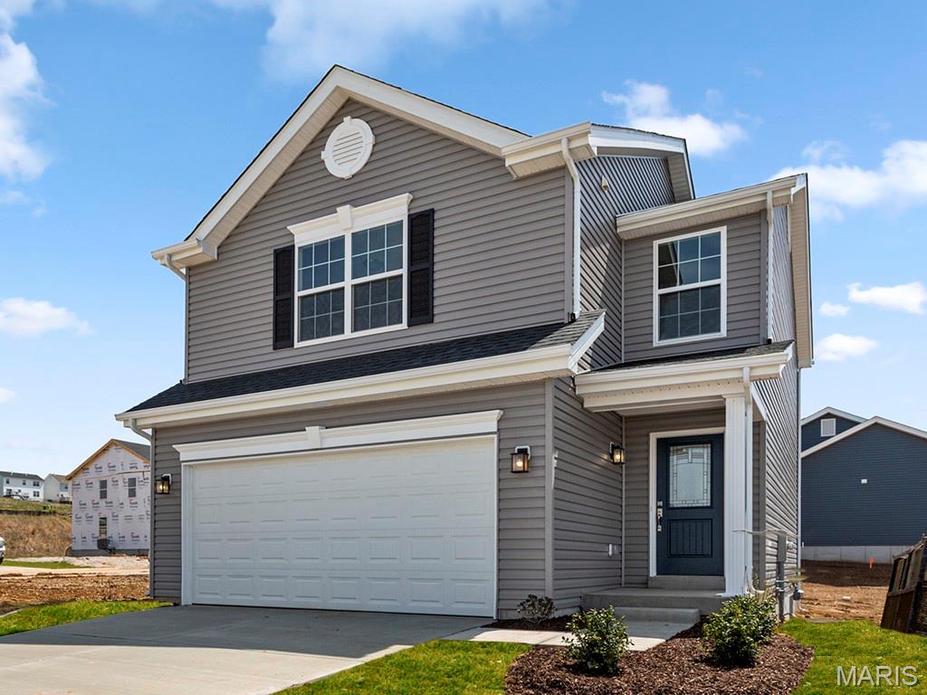 New McBride Homes 2 story Arlington 3BR, 2.5BA is ready now! Enjoy 6’ windows & wood laminate flooring throughout main living area. The kitchen features level 3 Benton Sarsaparilla 42” tall cabinets, quartz countertops, & stainless-steel GE appliances. The breakfast area opens to the backyard, and the living room features a large window and a ceiling fan. The primary suite features 2 walk-in closets and private bath with 5’ walk-in shower. Two more bedrooms with walk-in closets, full bath, & second floor laundry add convenience. Extras include white 6 panel doors, matte black fixtures, ceiling fan prewires, main floor powder room, 2-car garage with coach lights, & more! Located in House Springs, this community features 263 homesites off Bear Creek Road, just east of Gravois Road & Carol Park Road. Enjoy peace of mind with McBride Homes’ 10-year builders warranty & incredible customer service! Similar photos shown.