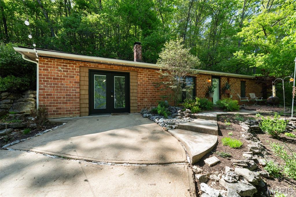Back on the market.  No fault of the Sellers.  The peaceful and scenic drive down Moss Hollow is a prelude of things to come once you arrive 8075 Glenn road.  This residence was constructed in 1985 and is picture perfect for private living on a 3+ acre lot that still remains close enough to convenient shopping(Karsch's) and restaurants.  Imagine a great meal at Trattoria Giuseppe's followed up by dessert at Ginny's Custard-two local landmarks.  The current owners have worked diligently and thoughtfully so that a new owner will have a simple turnkey experience. Three bedrooms and two spacious full bathrooms, ensure ease of living in this well thought out property.  The light filled Master suite has one of the Full bathrooms and the other is just off of the hall.  An Additional Shed/Outbuilding provides options for plenty of storage or a work area and even room for resident chickens.