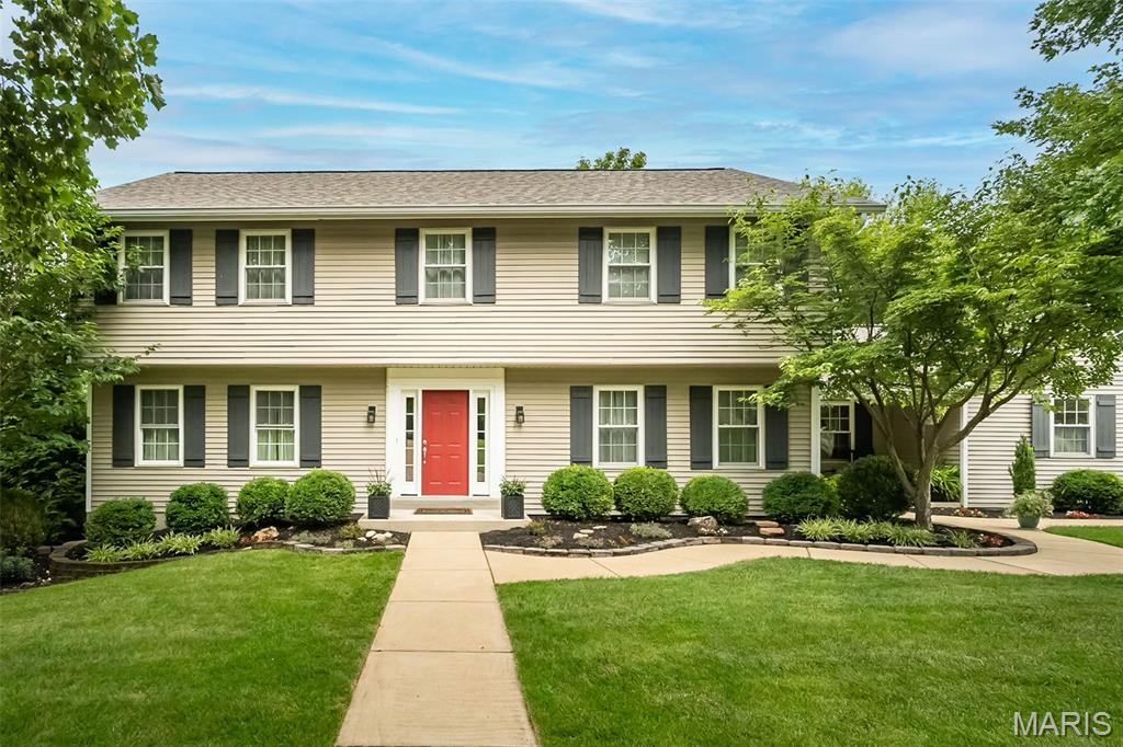 Welcome to Mason Valley, one of Town & Country’s most sought-after neighborhoods, where tree-lined streets, tennis courts, trails, neighborhood gatherings and the natural beauty of nearby Queeny Park create an exceptional place to call home.

This warm and inviting two-story home offers numerous updates, generous living spaces and beautiful views of the expansive green common grounds. The spacious kitchen is designed for both everyday living and entertaining, with abundant gathering space and a breakfast bar. The adjoining Family Room features a brick fireplace and overlooks the common grounds, while a main floor office with two sets of French doors provides both an ideal work-from-home office and quiet retreat. A large Dining Room and especially functional main floor laundry complete the main level.

One of the home’s standout features is the beautiful, expansive deck, surrounded by mature trees that provide wonderful privacy while overlooking the sweeping common grounds and wooded views beyond. It’s an ideal setting for outdoor entertaining, morning coffee, evening dinners or simply relaxing and enjoying the peaceful surroundings.

Upstairs, the updated Primary Suite features a spacious 20' x 14' bedroom adjoined by a newly renovated bathroom (2025) with a soaking tub, separate shower, walk-in closet and dual vanities. Three additional generously sized bedrooms share an updated Hall Bath (2021).

The finished walk-out lower level expands the living space with a recreation room, beverage bar, full bath and 13' x 13' sleeping area with an 8' x 7' walk-in space. Step outside to enjoy the private backyard setting and views of the neighborhood tennis courts and common grounds.

An oversized garage, quiet non-through street and outstanding Town & Country location add to the appeal. Enjoy easy access to Queeny Park, Parkway schools, highways, shopping, dining, hospitals and everything West County has to offer.

Additional recent updates:  New roof (2025), new chimney liner and full cleaning (2026), kitchen appliances (2023-2026), carpet throughout (2020), renewed deck (2018), washer/dryer (2025), fresh paint throughout (2026).

A rare opportunity to enjoy the space, privacy, setting and community of Mason Valley.