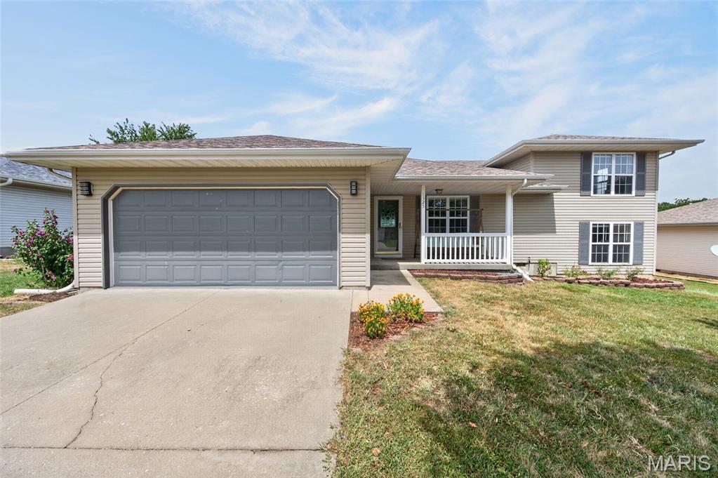 WELCOME HOME TO THIS MUILTI LEVEL 4 BEDROOM, 3 BATH HOME with  A FINISHED PARTIAL WALK-OUT  BASEMENT.   VERY WELL MAINTAINED, HOME  OFFERS UPDATED KITCHEN CABINETRY, SOLID SURFACE COUNTERS, STAINLESS APPLIANCES,  A VAULTED LIVING ROOM with. A FIREPLACE.   MASTER IS ON THE MAIN LEVEL, LAUNDRY ROOM AS WELL, 2 CAR ATTACHED GARAGE, A FEW STEPS UP TO THE BEDROOM #2 & #3  THAT SHARE A FULL BATH.   THE LOWER LEVEL FAMILY - OR BEDROOM #4 AREA OFFERS A FULL BATH AS WELL. and A CORNER GAS LOG FIREPLACE. 
  THE REAR DECK IS VERY WELCOMING AS YOU HAVE THE OPEN AIR UNCOVERED SPACE,  and A COVERED PORCH AREA.
THIS GREAT ADDITION TO THIS HOME IT HAS A WOODEN PRIVACY FENCE  perfect FOR THE FAMILY with CHILDREN OR YOU FURRY FRIENDS
GREAT LOCATION.  THIS HOME WILL SOON HAVE NEW ARCHITECTURAL SHINGLES INSTALLED.
EASY ACCESS TO I-44 FOR THE COMMUTERS.    A GREAT ESTABLISHED NEIGHBORHOOD. 

DON'T WAIT TO LONG TO BOOK YOUR SHOWING ON THIS RARE FIND.