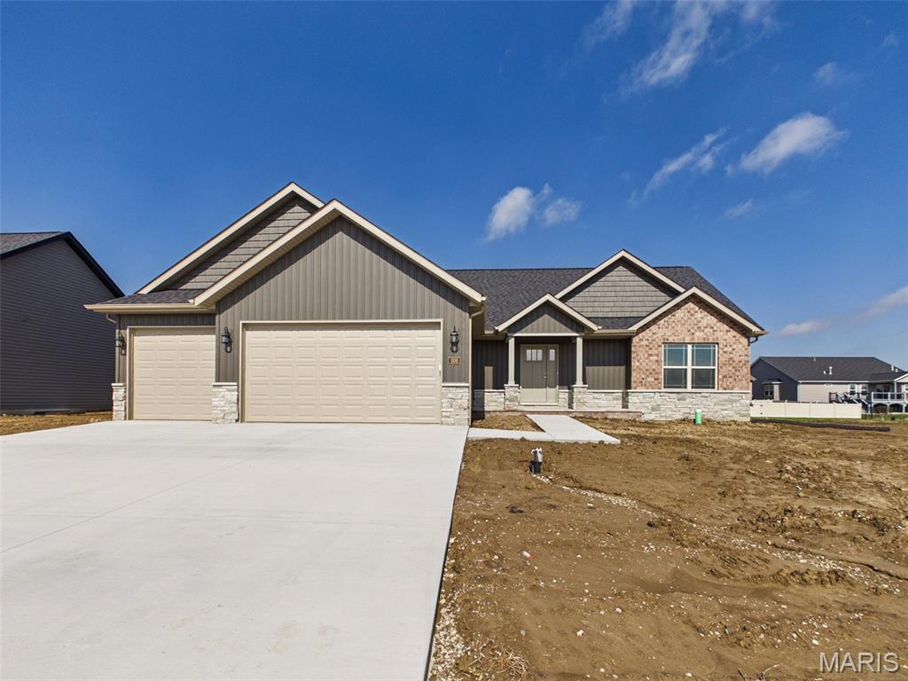 Great Value on this 5 bed-4 bath home.... This split bedroom design has hardwood floors flowing throughout the main living area. An open floor plan with modern fireplace opens to covered deck and outside patio area. The main floor laundry, walk in pantry, 1/2 bath off 3 car garage and drop zone makes this home ideal for today's living. The primary suite with oversized walk-in closet offers double bowl vanity and custom walk in shower. Finished lower level has 2 bedrooms, full bath and large family room area. Perfectly blended for style and function, a must see! Yard to be sodded. Skyline Custom Homes (30 + years experience)