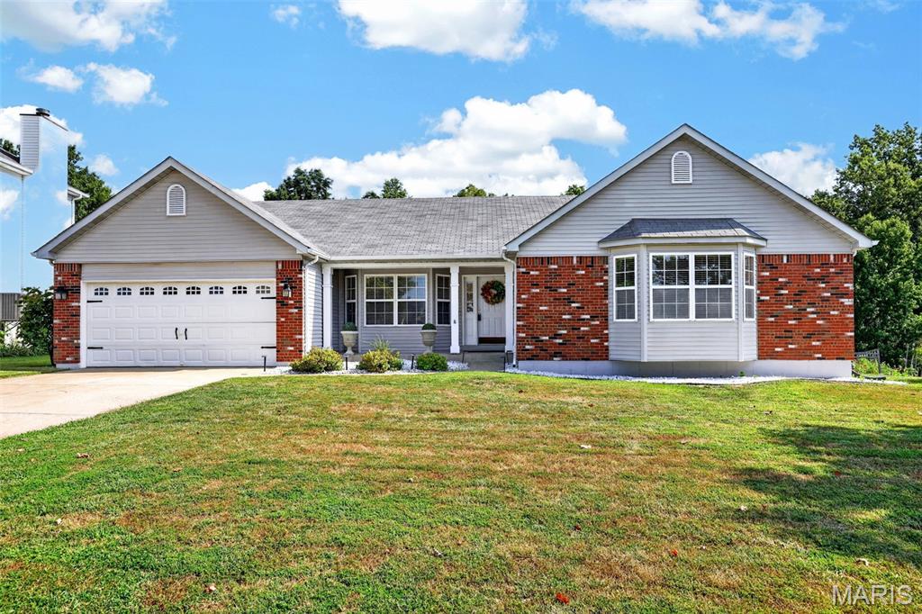 Welcome to this charming ranch in the desirable Canvas Cove subdivision! This inviting home offers a separate dining room, large light filled family room, three bedrooms and two full baths on the main level, along with a convenient laundry/mudroom located between the oversized 2 car garage and eat in kitchen. Enjoy relaxing or entertaining on the screened porch and deck, both overlooking the spacious backyard. The  walk-out lower level provides even more living space, featuring a full bath, a versatile room perfect for an office or additional bedroom, a bar and family room, plus two generous storage areas. With comfortable living spaces inside and plenty of outdoor space to enjoy, this home has so much to offer.