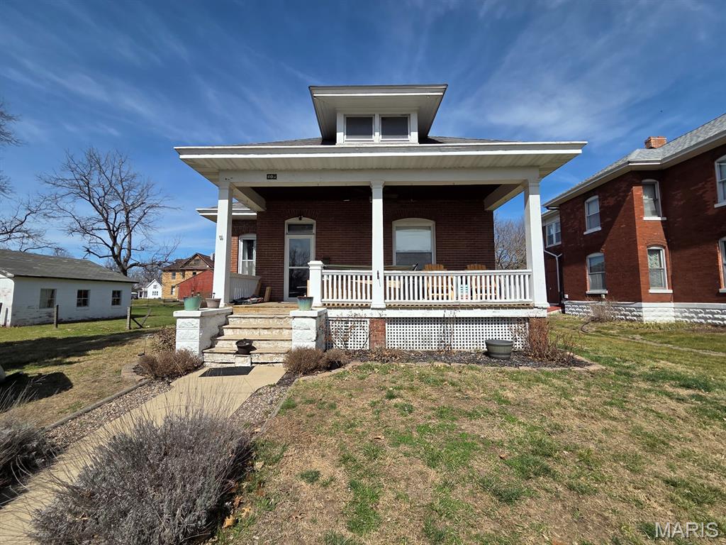 So much to appreciate here - this classic brick bungalow offers an updated open floor plan, sunny kitchen, spacious dining & cozy living room space that greets you as soon as you walk in the door.  You'll love the original hardwood floors, wood trim, pocket doors & fixtures.  Combine those with the new kitchen - featuring new cabinets, counters, black stainless steel appliances, fixtures, lighting, trim & more - and you've got a completely move-in-ready home to appreciate.  Two full bedrooms each have plenty of closet space and a large bath includes a shower, plenty of built in storage and more.  The handy back porch provides plenty of storage & cabinet space as well as main-level laundry hookups. The full basement houses the utilities and offers workshop/storage space and a canning room.  A sunny entryway offers a place to drop coats & shoes before entering.  You'll be ready for summer barbecue season with the back deck offering plenty of space for the grill & dining table.  The deck overlooks the completely fenced back yard - ready for pets, a swing set, garden or whatever else you need room for.  Located on quiet Grant St, this is a quick drive to downtown attractions, the riverfront and school.  Utility providers here include Ameren Electric, Liberty Gas, City of Canton water/sewer/trash, and both Rise & Brightspeed Fiber are available.