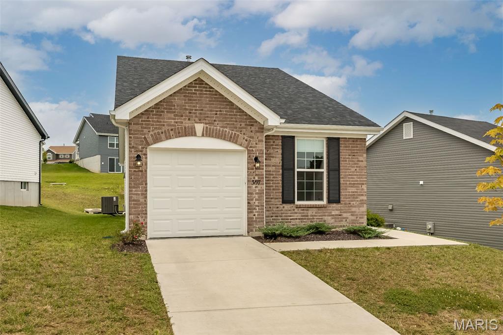 Skip the builder's timeline and move right into this 2024 ranch in beautiful Crossings at The Timbers! Built in 2024, this 2-bedroom, 1-bath ranch offers all the benefits of new construction without the construction timeline. Inside, you'll find an open-concept layout with soaring vaulted ceilings, luxury vinyl plank flooring throughout the main living areas, recessed lighting, and abundant natural light. The spacious kitchen features stainless steel appliances, ample cabinet and counter space, and a breakfast bar that opens seamlessly to the great room—perfect for everyday living and entertaining. The oversized bath includes a double vanity, and the convenient main-floor laundry makes daily routines a breeze. The walkout lower level provides excellent storage today and exciting potential for additional finished living space tomorrow, with rough-in for bathroom. Located in a growing community of newer homes just minutes from I-55, Mastodon State Park, shopping, dining, and everyday conveniences, this home offers the perfect opportunity to enjoy like-new construction without the wait!